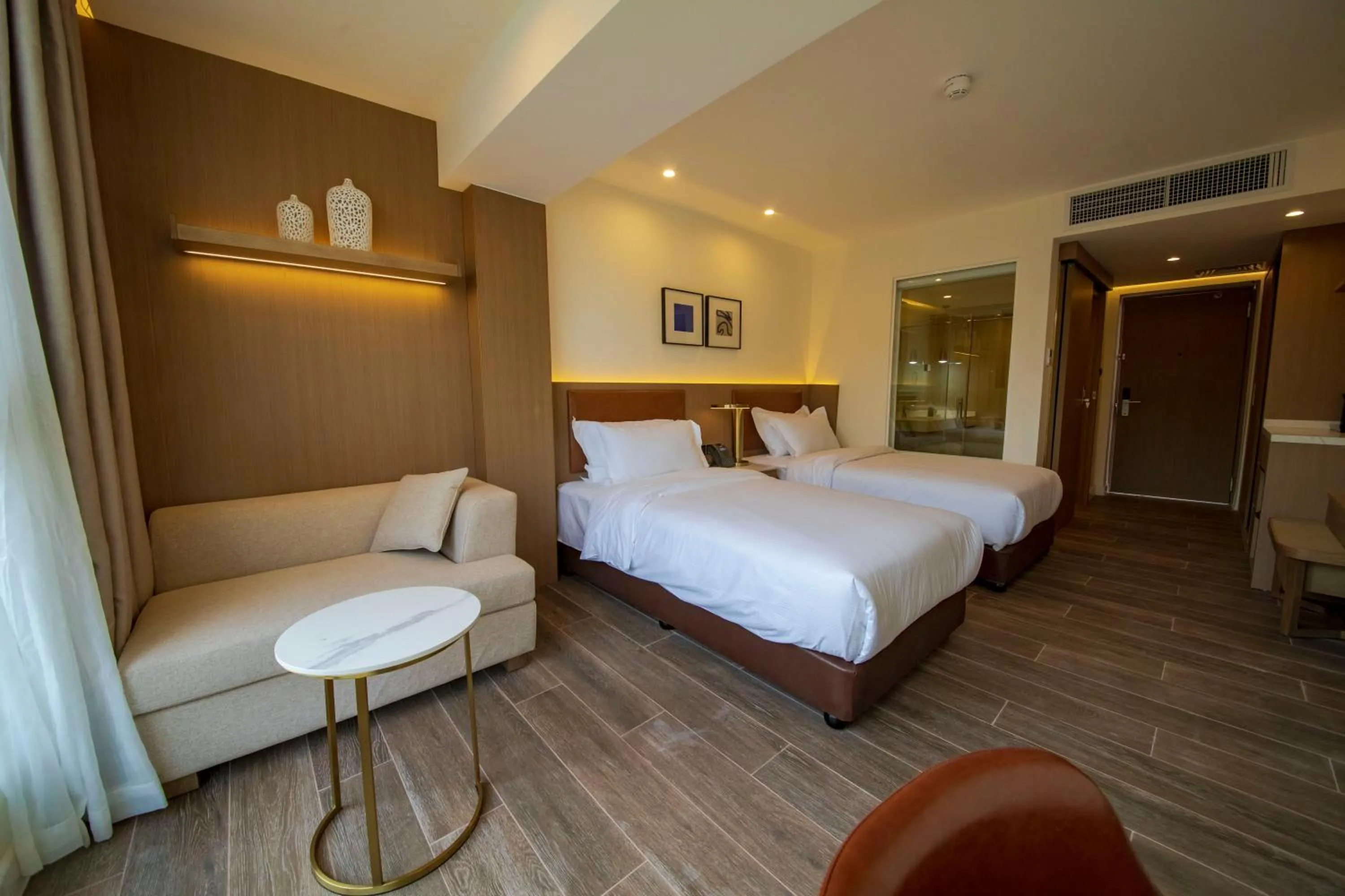 Bedroom, Bed in Luxotel Aqaba Beach Resort & Spa Only 15 years plus