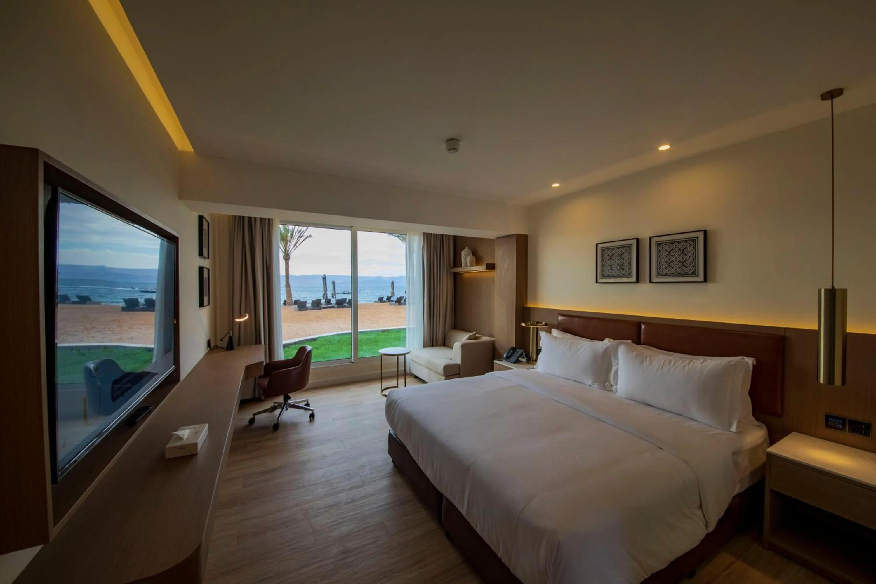 Photo of the whole room, Bed in Luxotel Aqaba Beach Resort & Spa Only 15 years plus