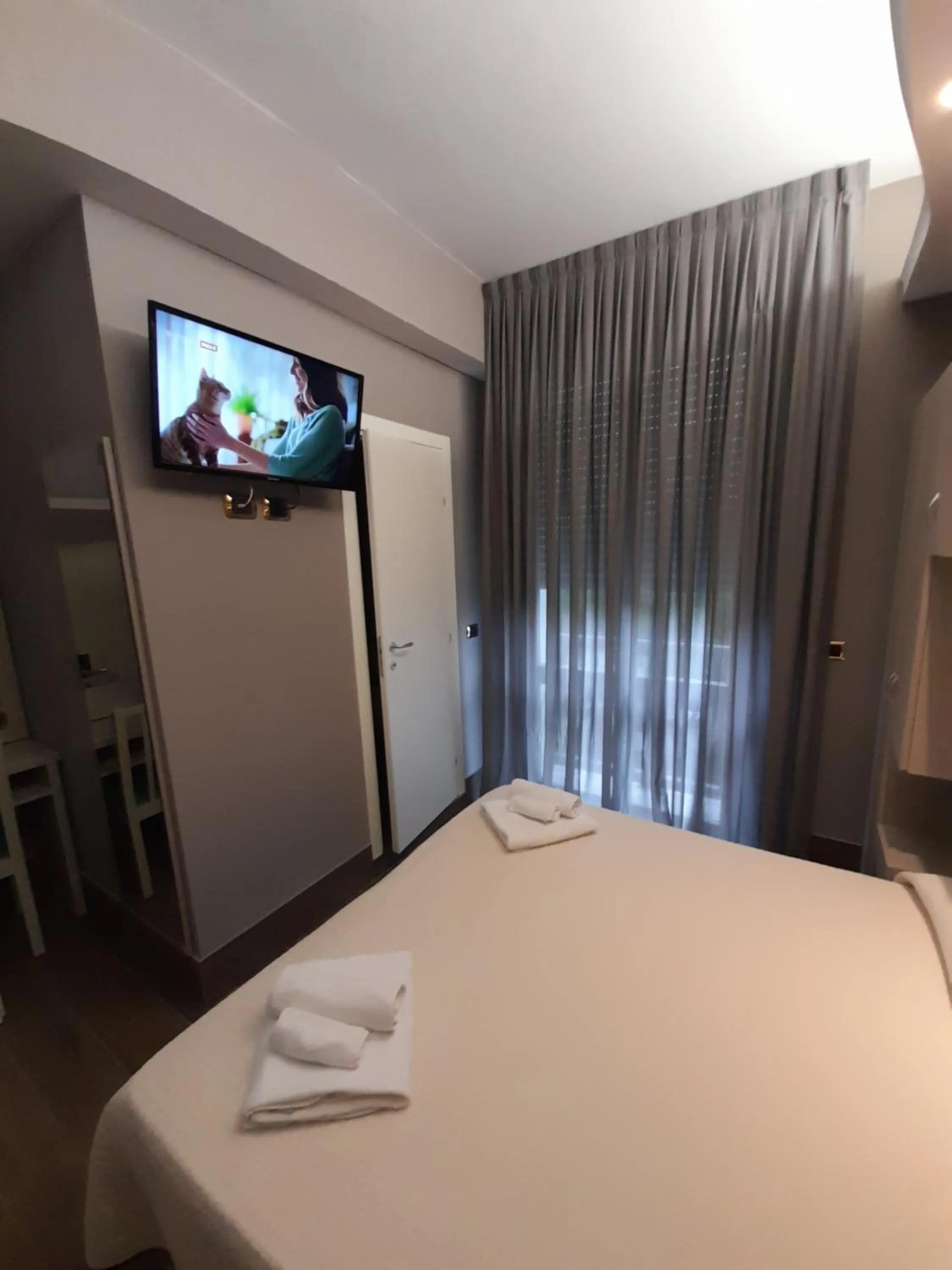 Bed in Hotel Royal Plaza