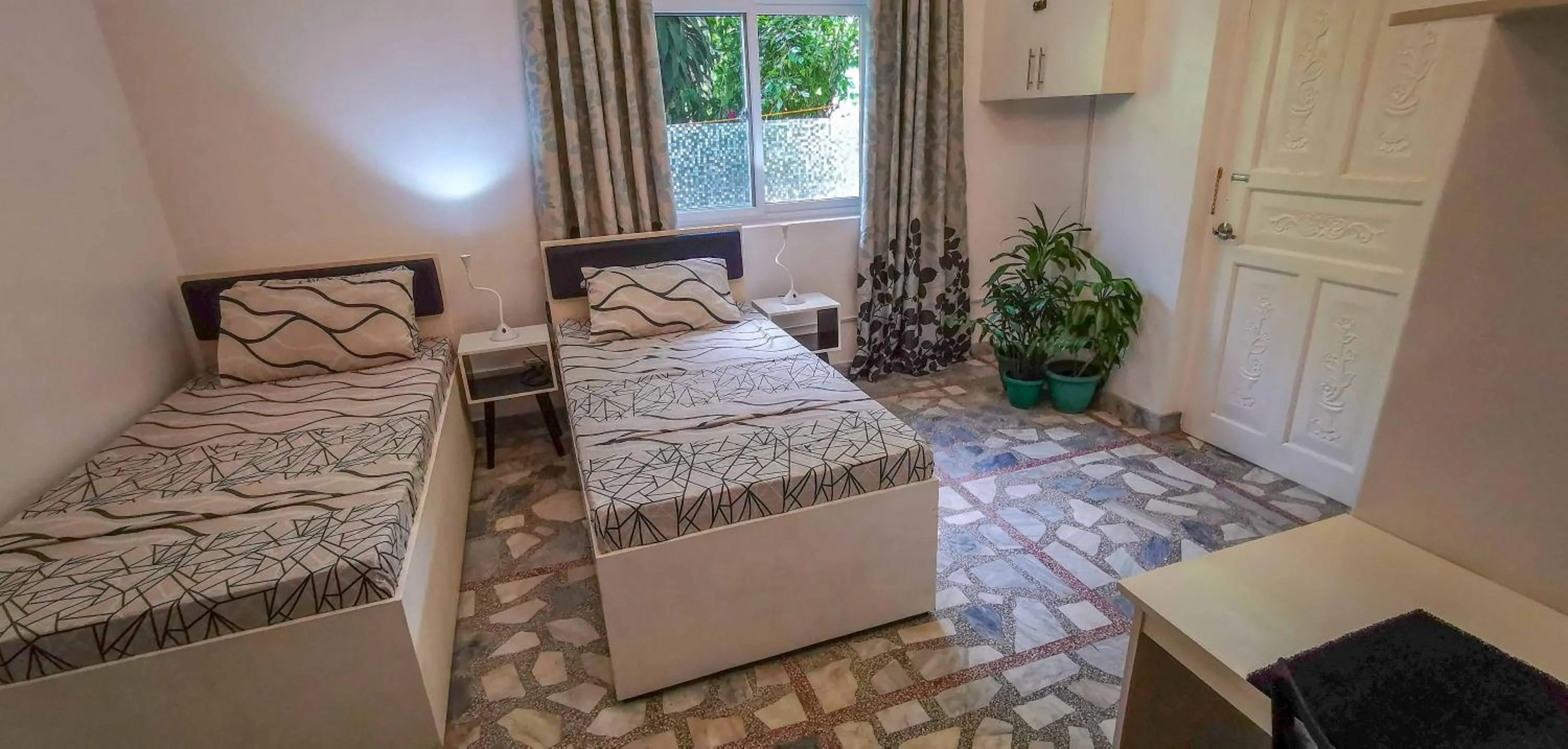 Bed in The Three P Beach Resort & Dive Center