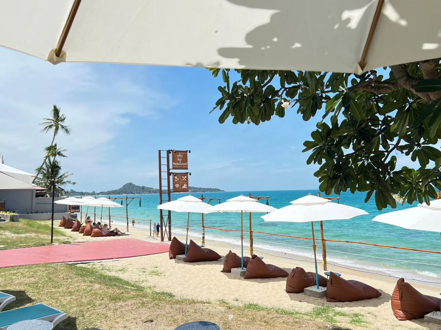Beach in Aura Samui Best Beach Hotel - SHA Plus