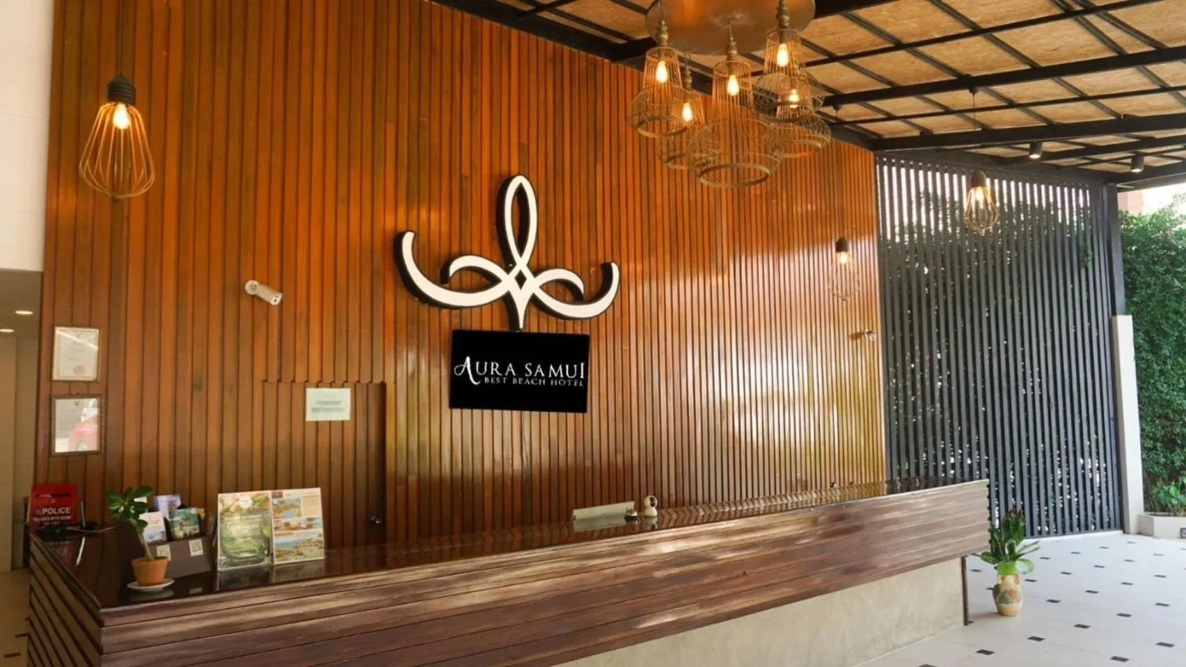 Property logo or sign in Aura Samui Best Beach Hotel - SHA Plus