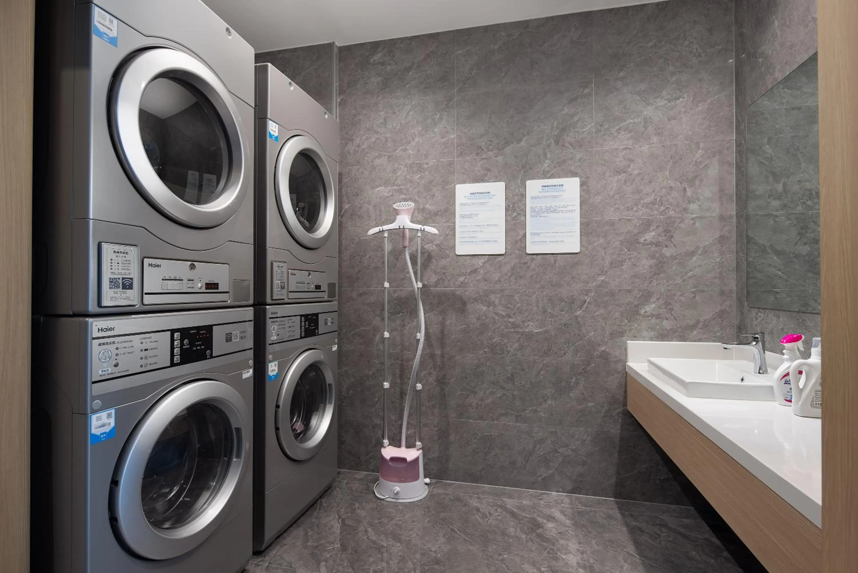 washing machine in Holiday Inn Express Changsha University Tech City by IHG