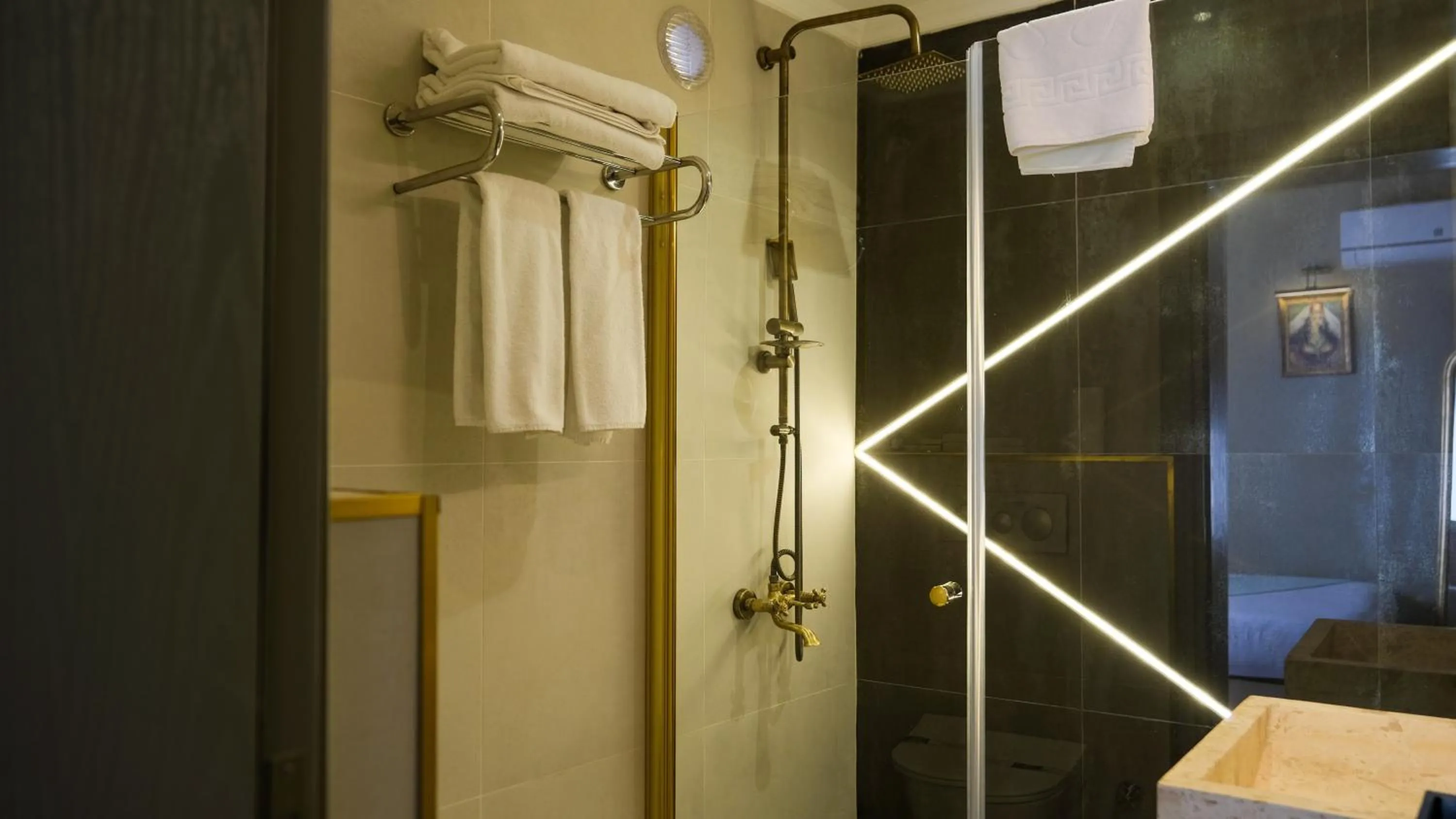 Shower in By Kinyas Hotel