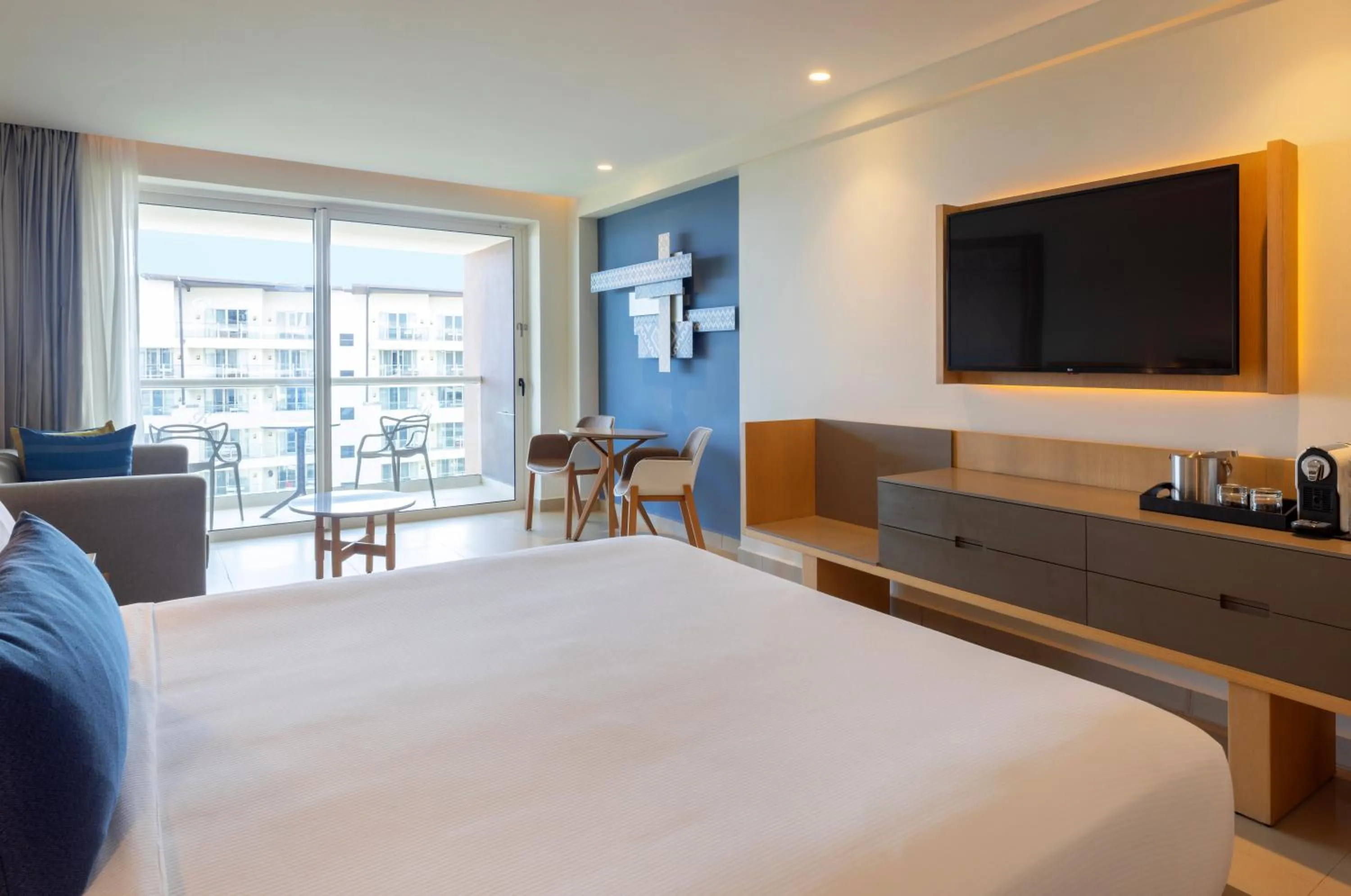 Bed in Royalton Splash Riviera Cancun, An Autograph Collection All-Inclusive Resort