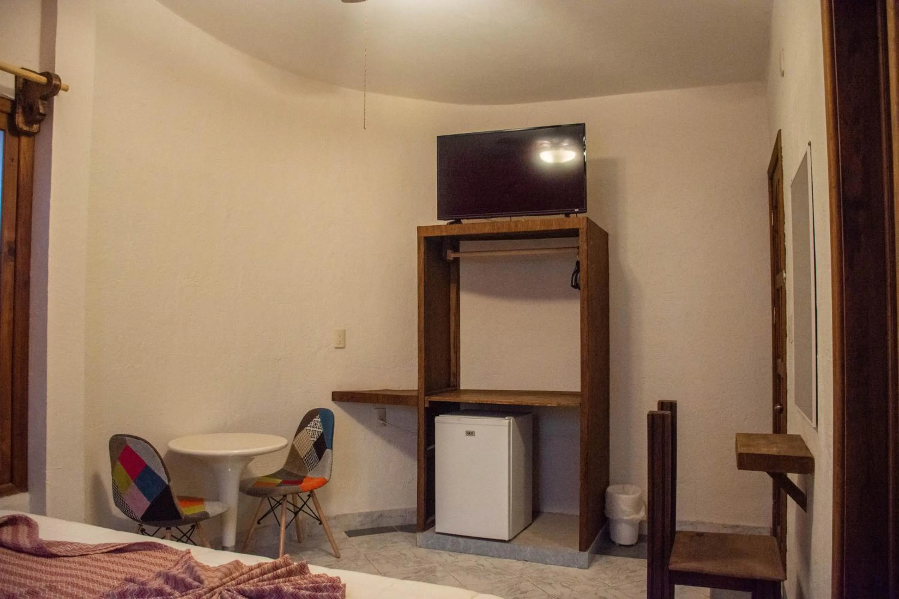 TV/Entertainment Center in Hotel Real del Carmen - Ideal para familias y parejas