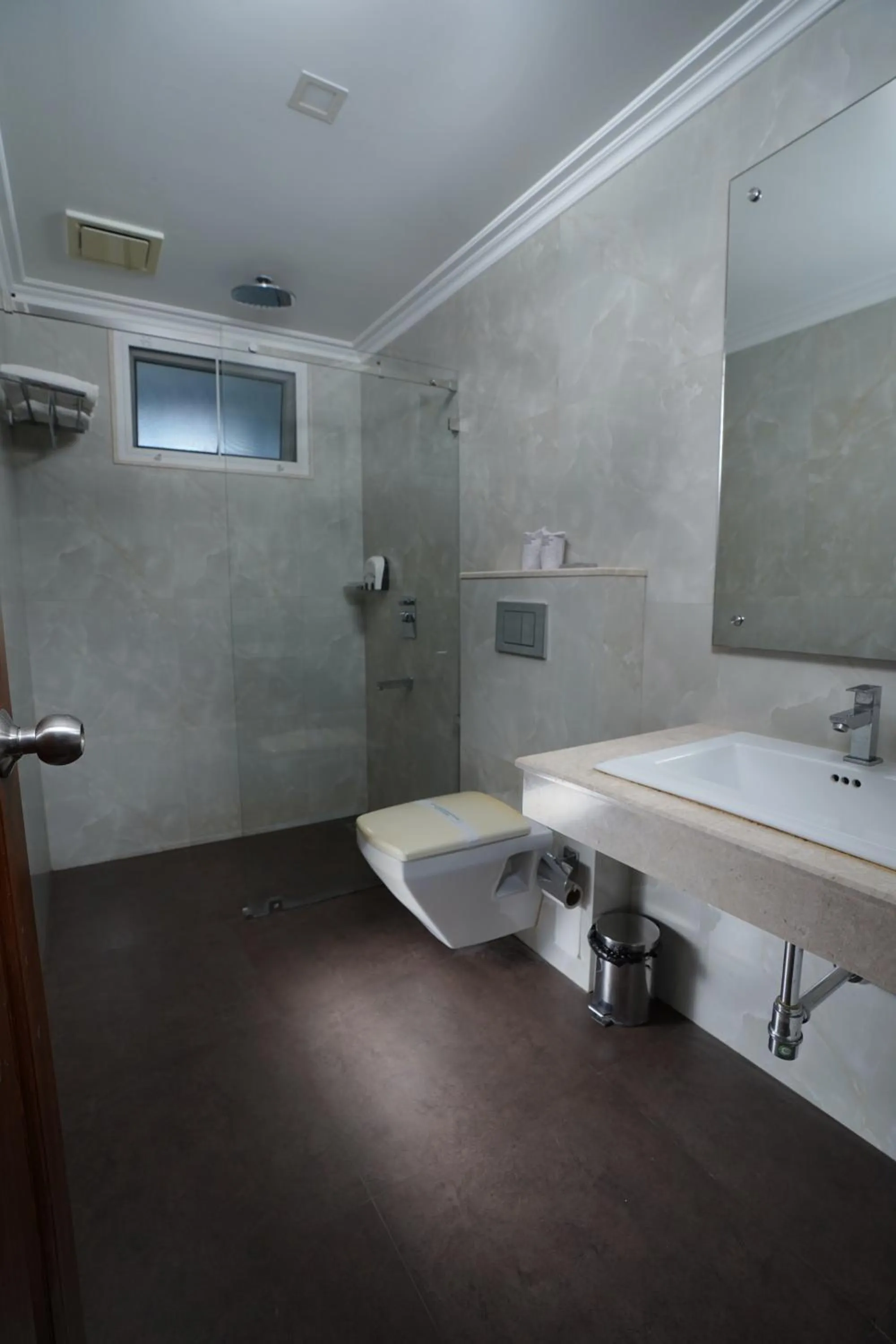 Bathroom in TGR SUITES