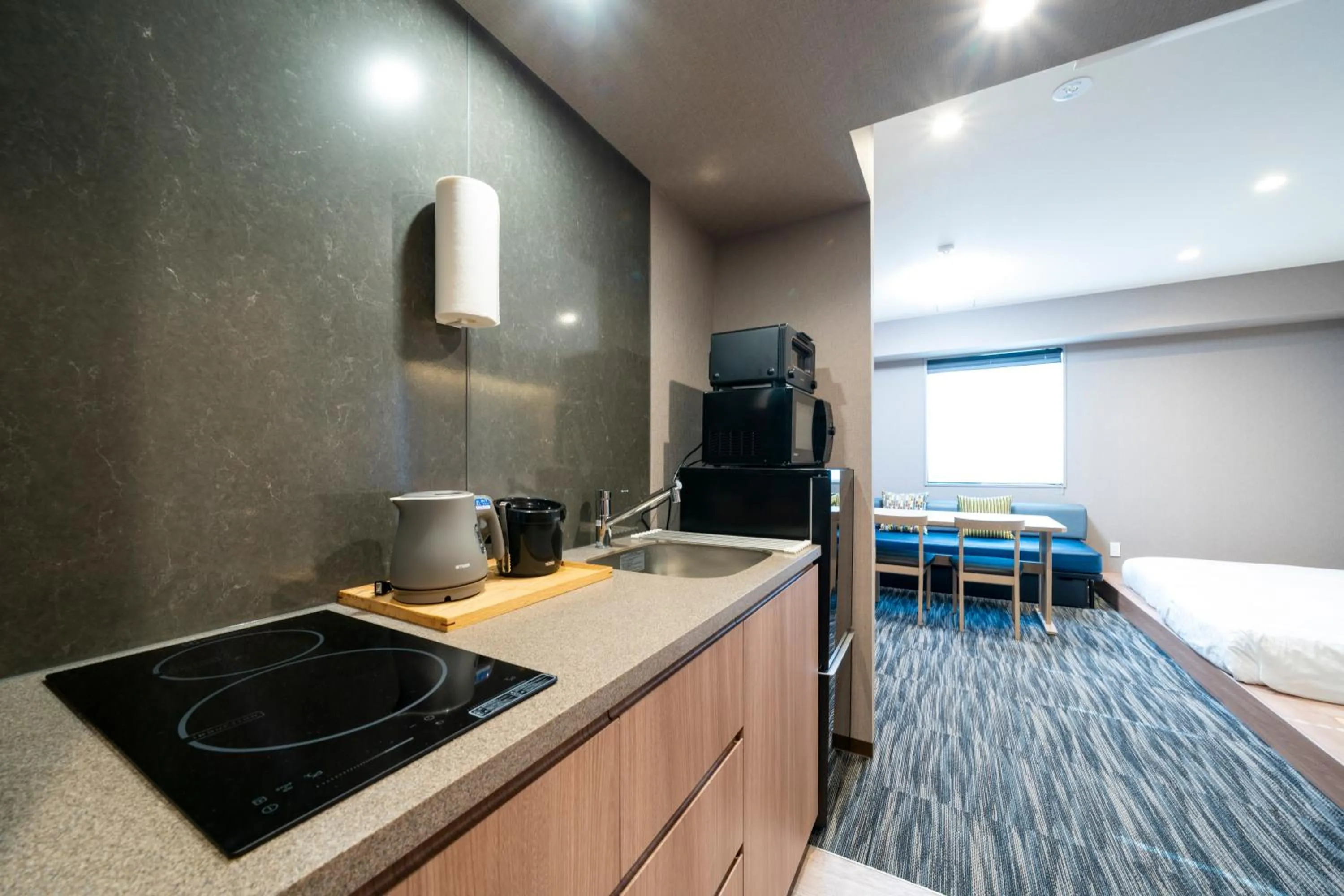 Photo of the whole room, Bed in KOKO HOTEL Residence Asakusa Kappabashi