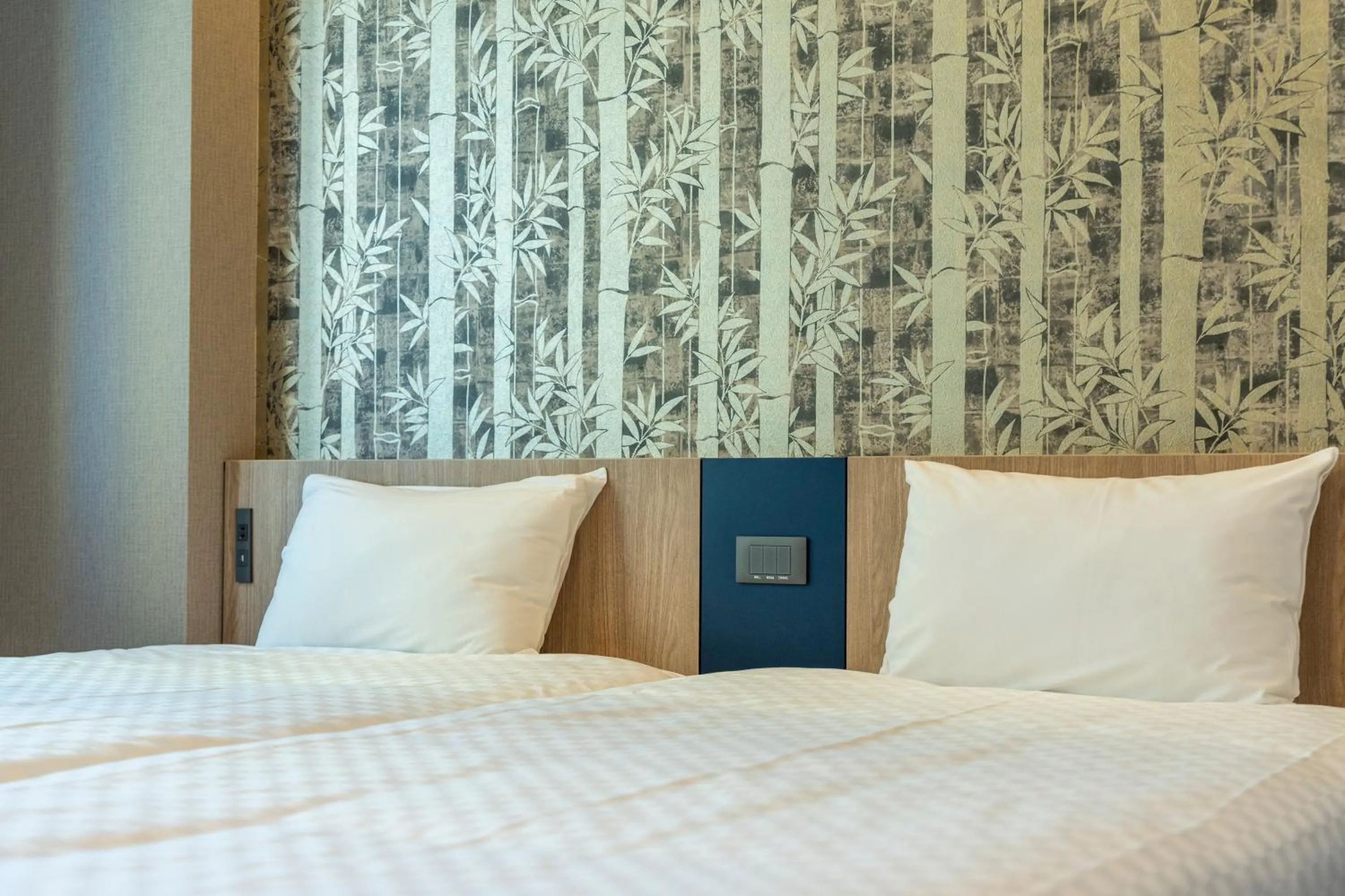 Bed in KOKO HOTEL Residence Asakusa Kappabashi