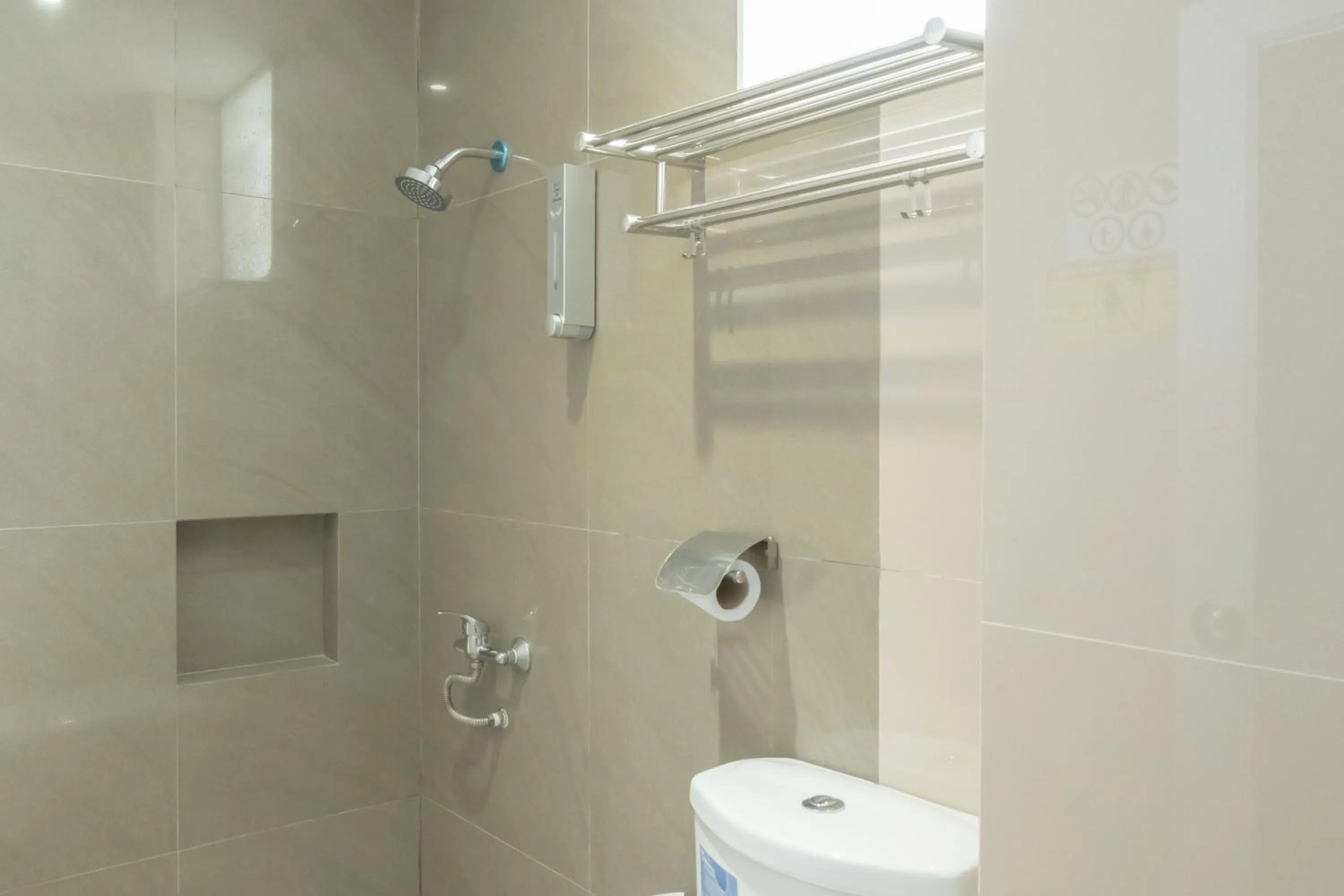 Toilet in Class Premium Guest House