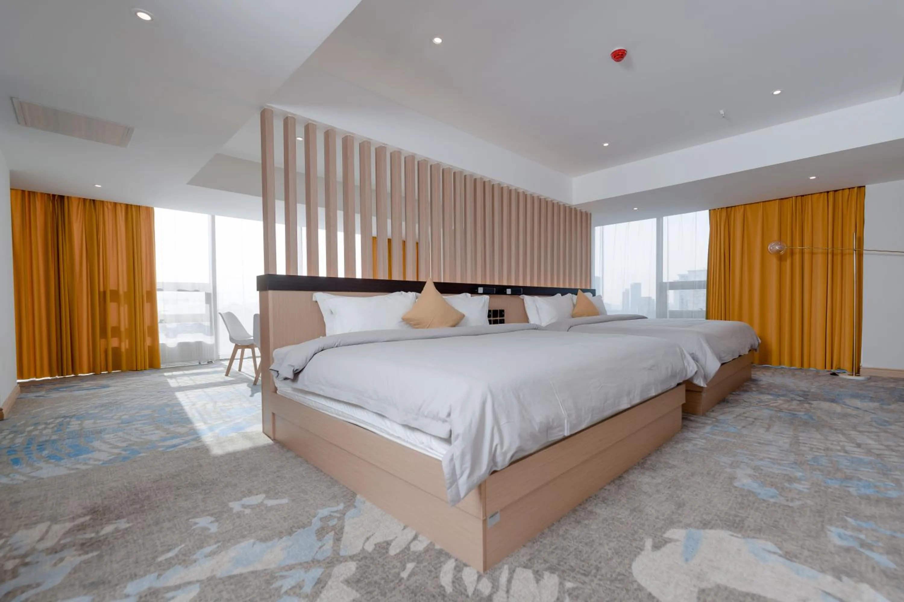 Photo of the whole room, Bed in MIllennium Plaza Hotel & Mall Ulaanbaatar