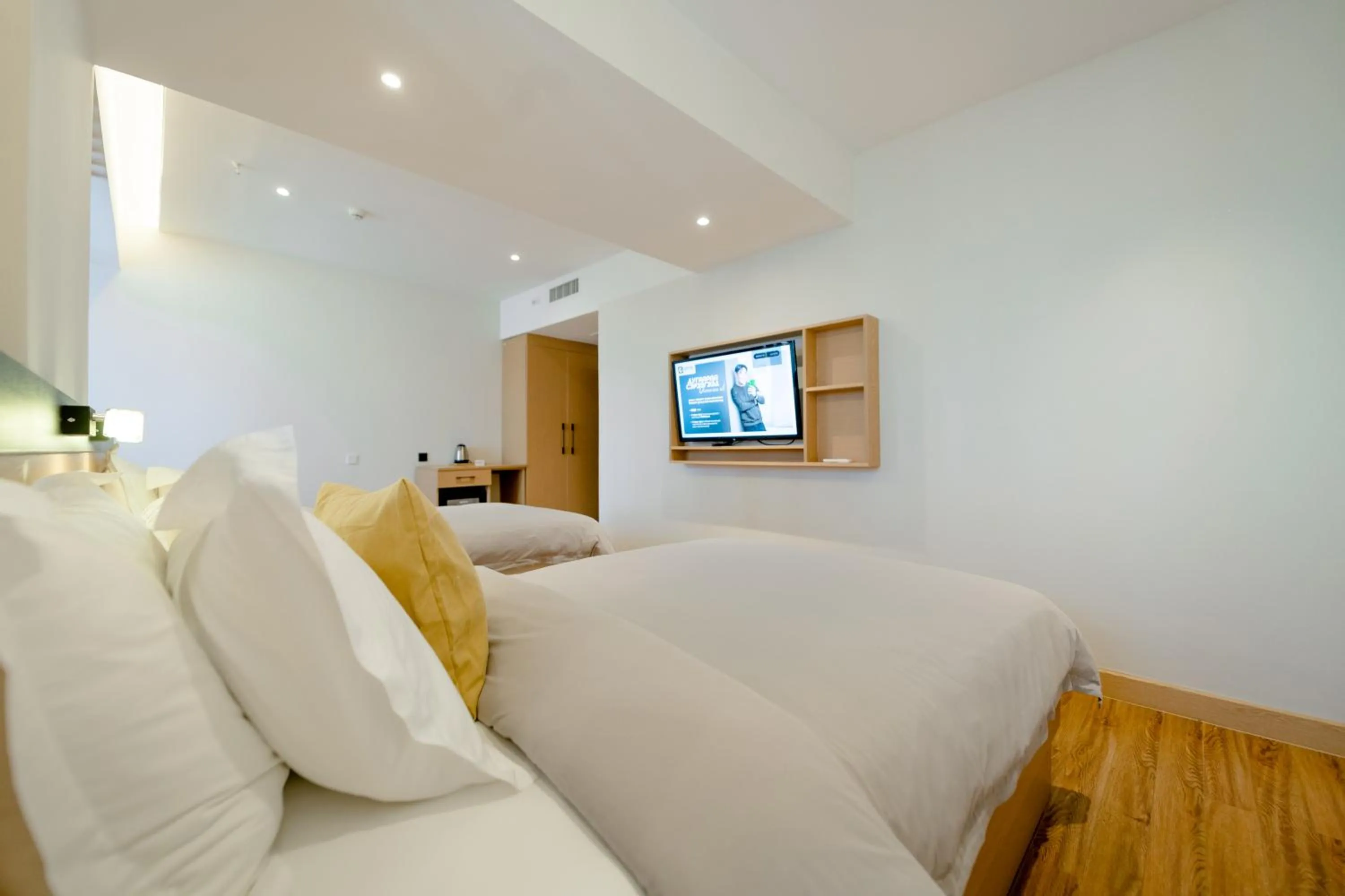 Bed in MIllennium Plaza Hotel & Mall Ulaanbaatar