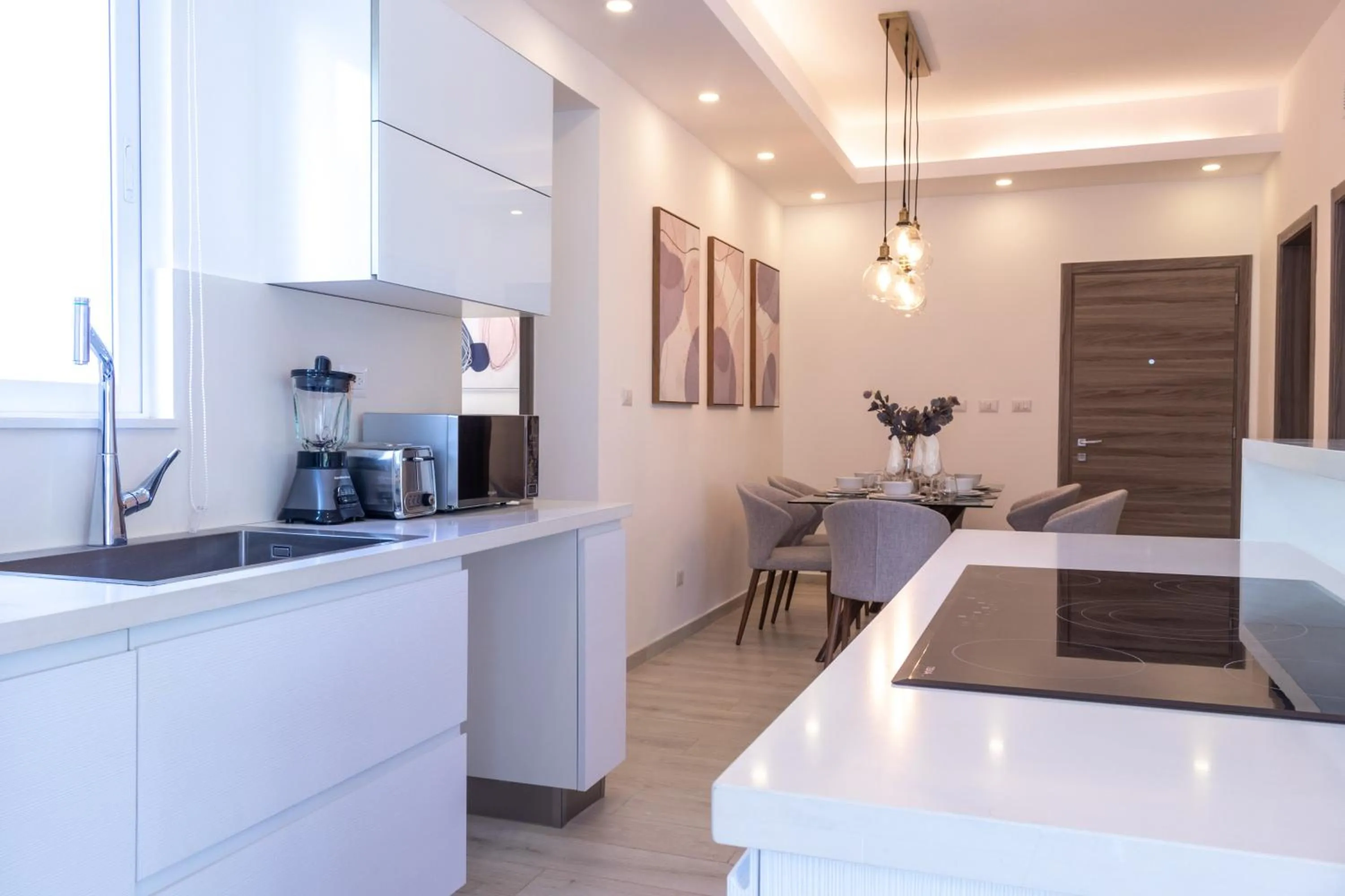 Kitchen or kitchenette in Family Getaway Apartment - Right On The Beach