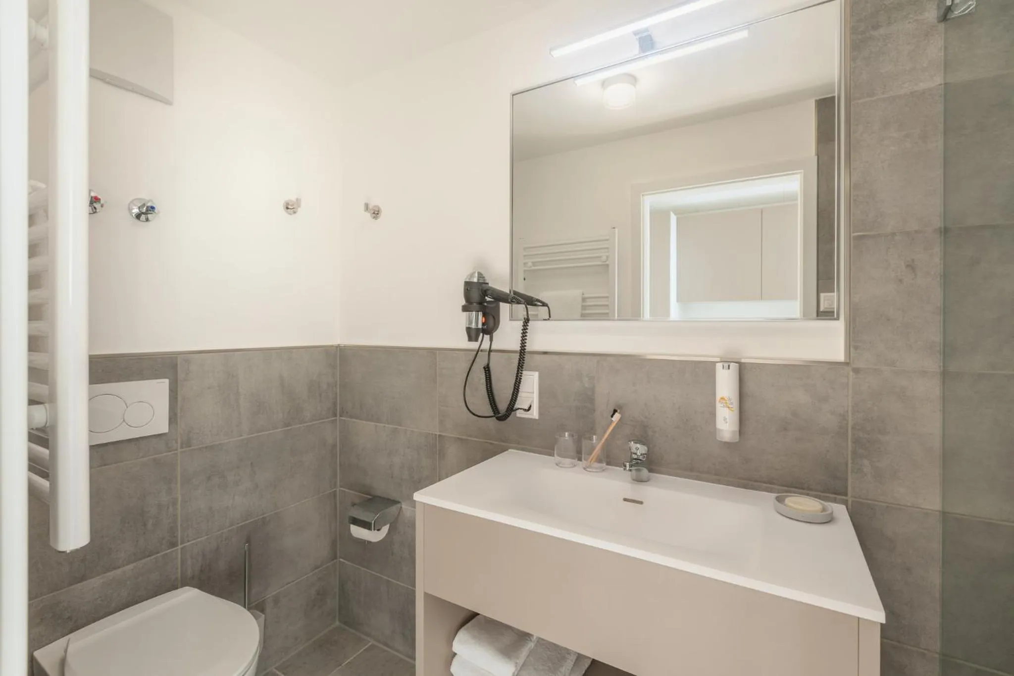 Bathroom in Candlewood Suites Heidelberg by IHG