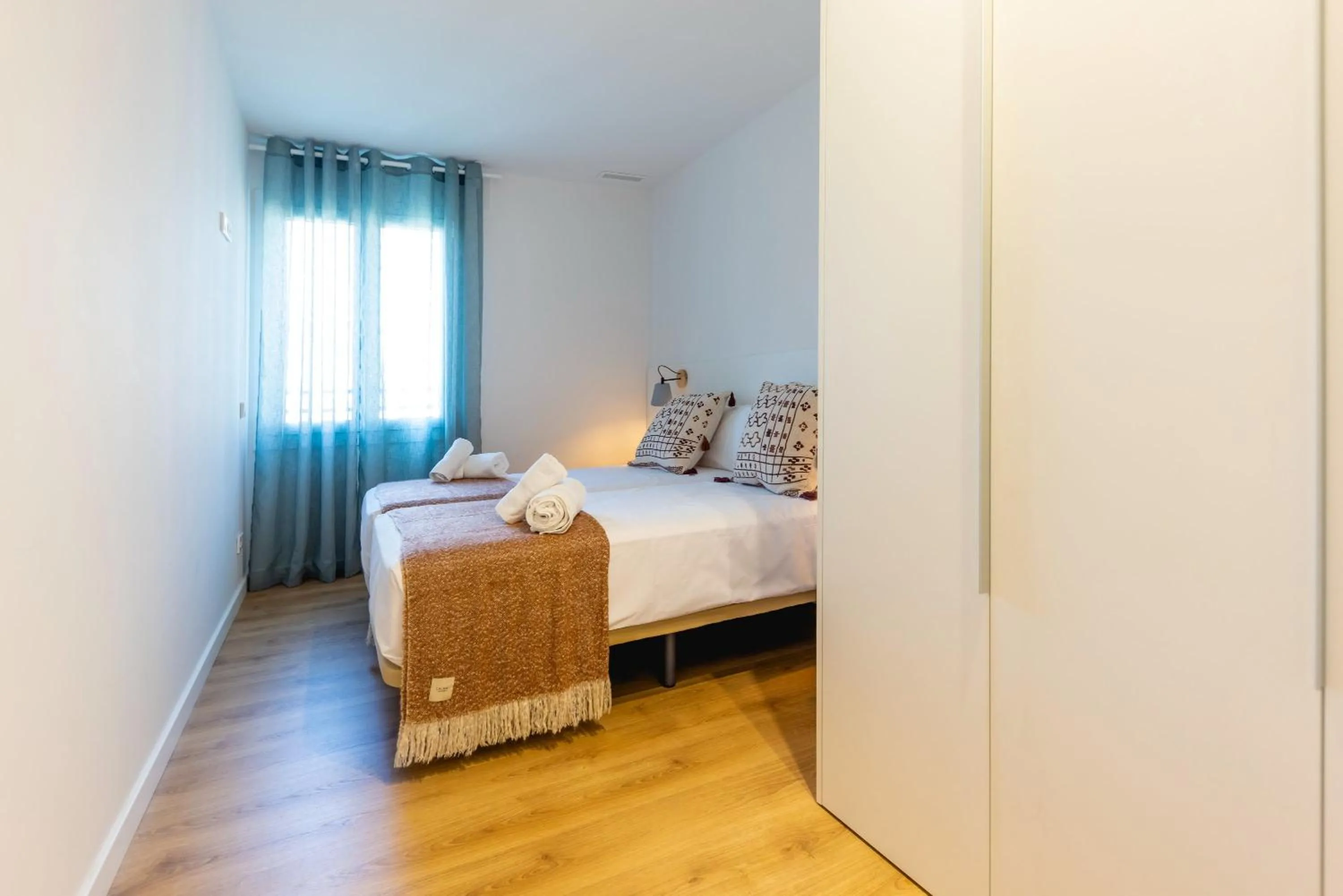 Bed in Bravissimo Tarlà, 2-bedroom apartment