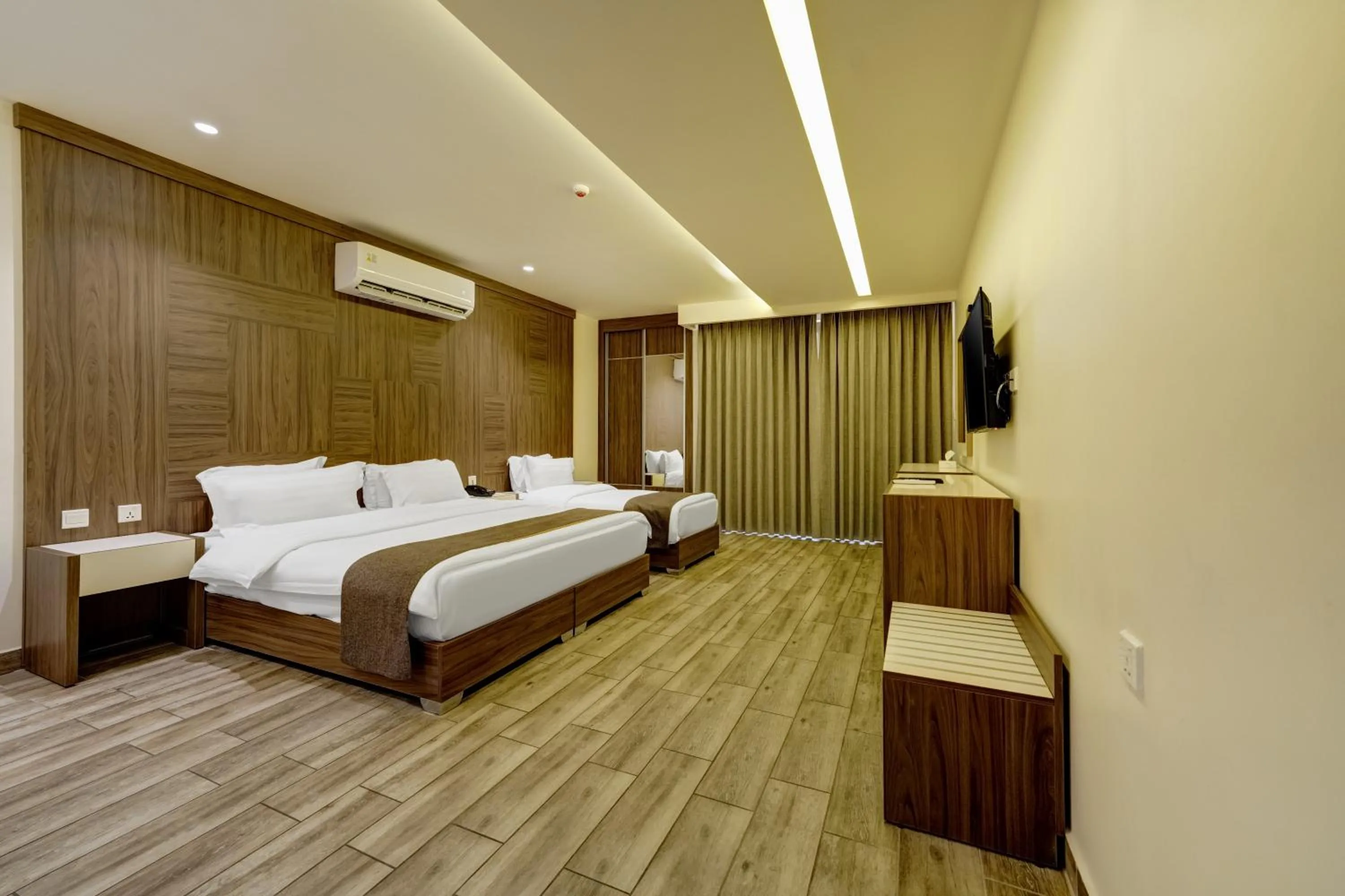 Communal lounge/ TV room, Bed in Luciana Hotel by FHM
