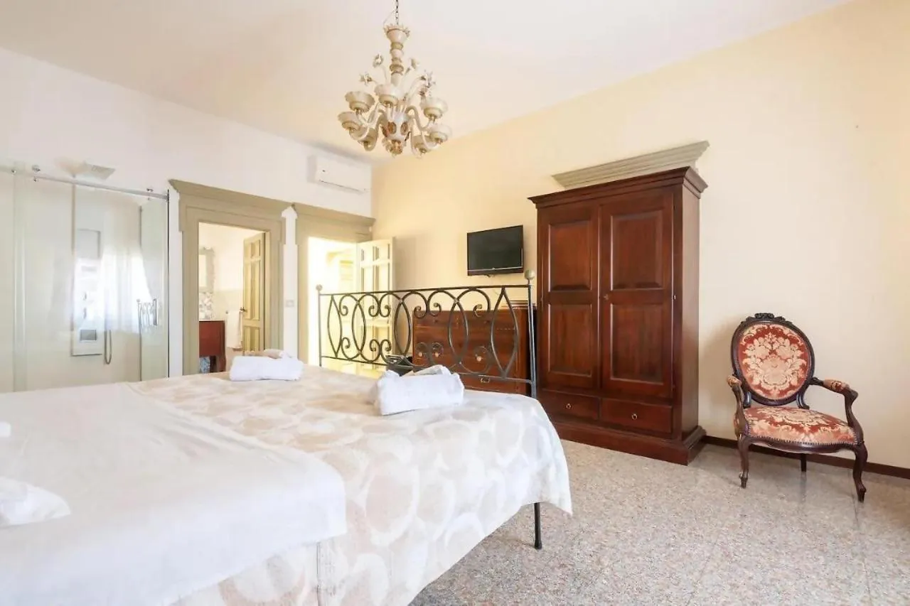 Bed in Errico Suite e Rooms