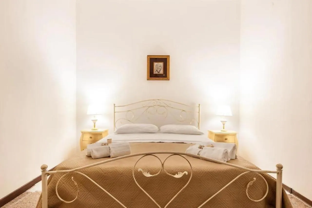 Bed in Errico Suite e Rooms
