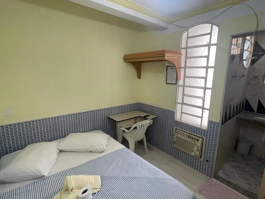 Bed in Hotel Independência