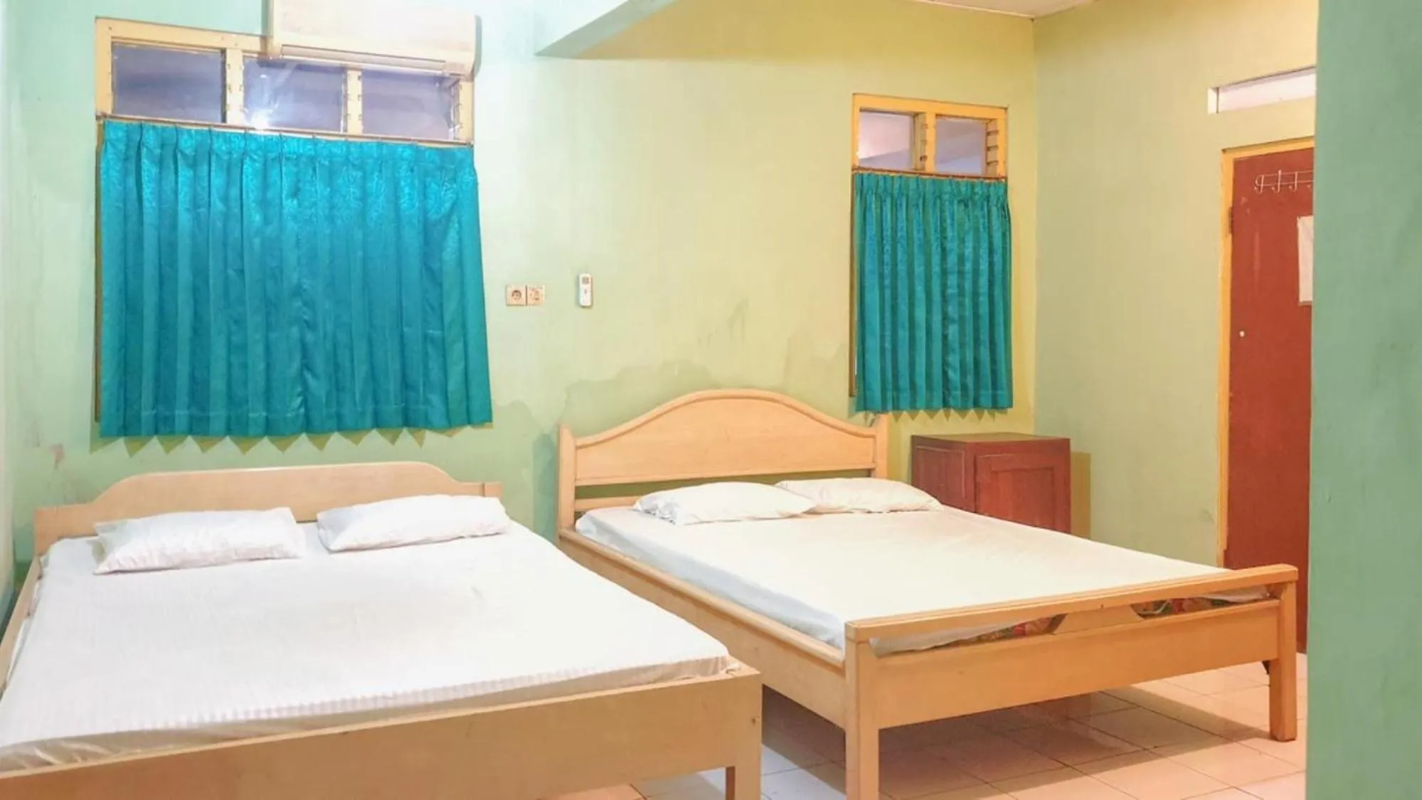 Bedroom, Bed in Hotel Jaya Kusuma near Candi Prambanan Mitra RedDoorz