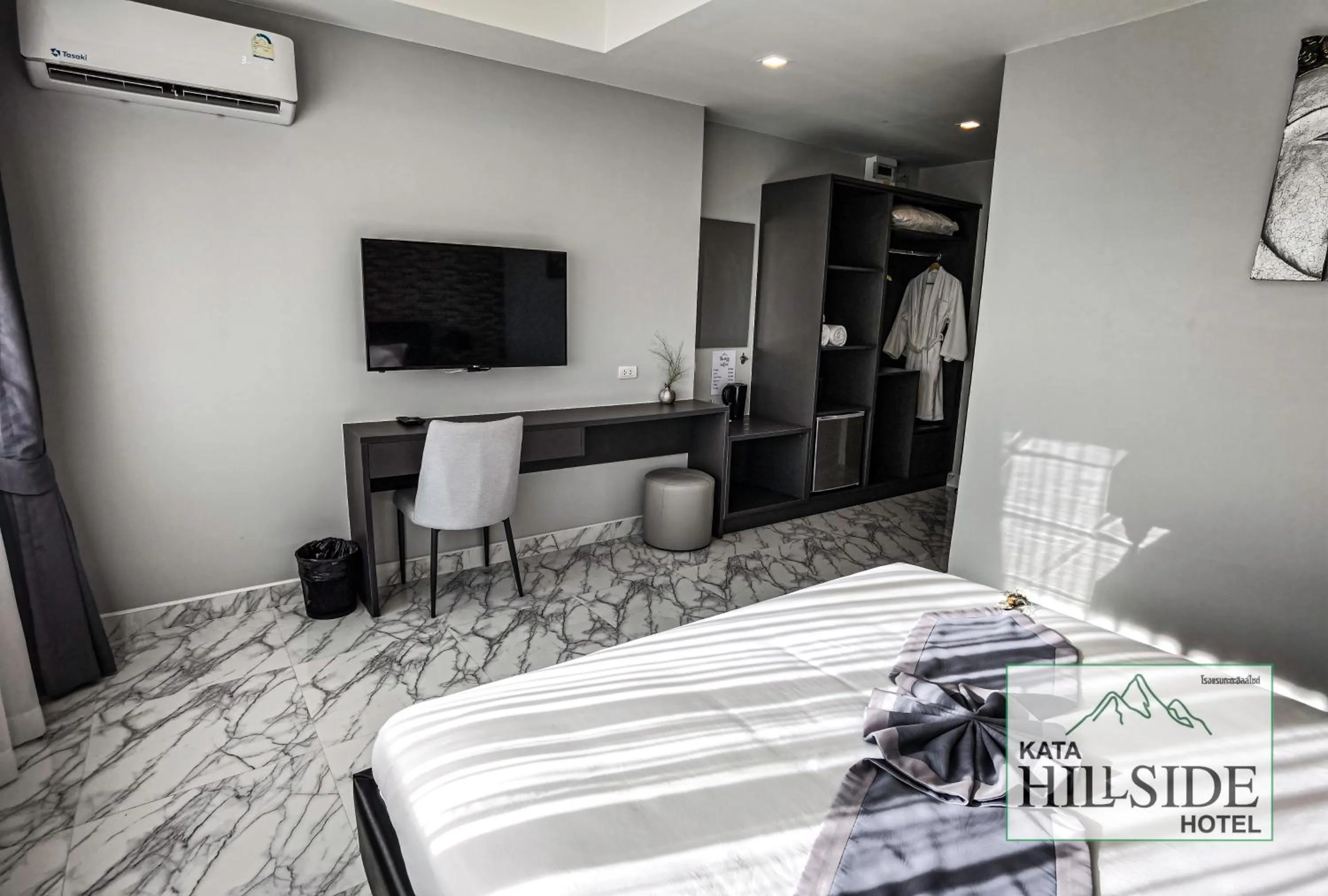 Bed in Kata Hillside Hotel