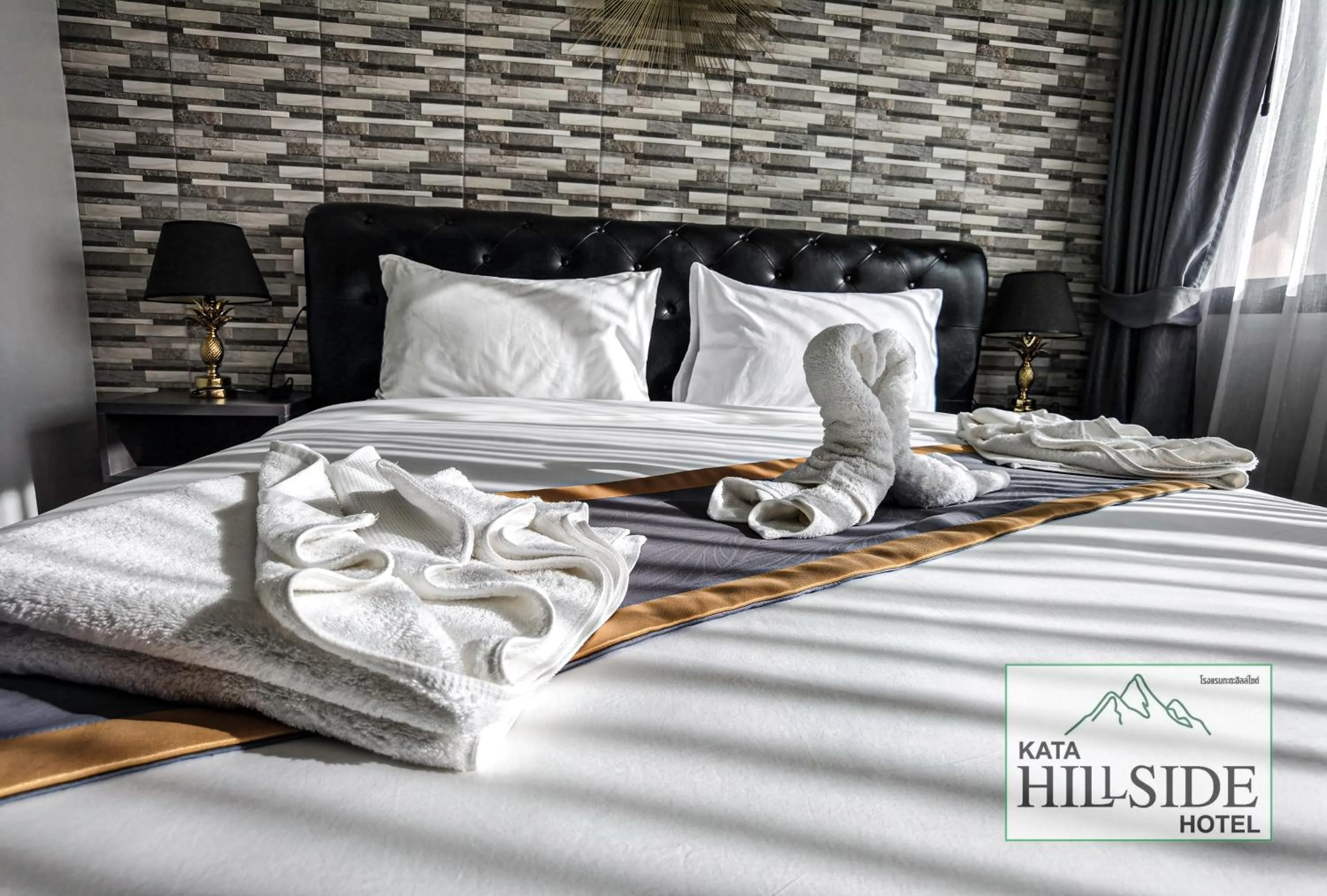 Bed in Kata Hillside Hotel