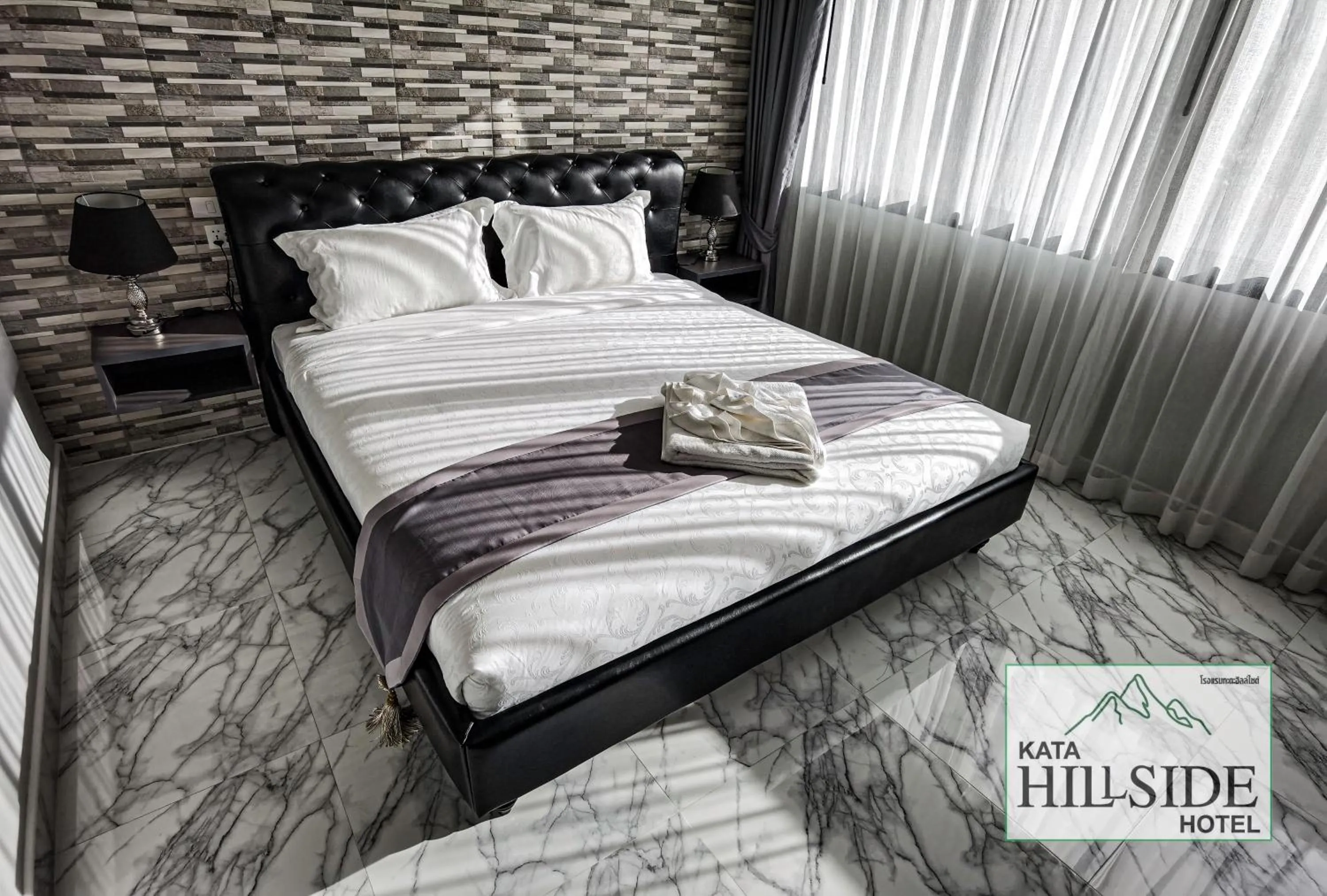 Bed in Kata Hillside Hotel