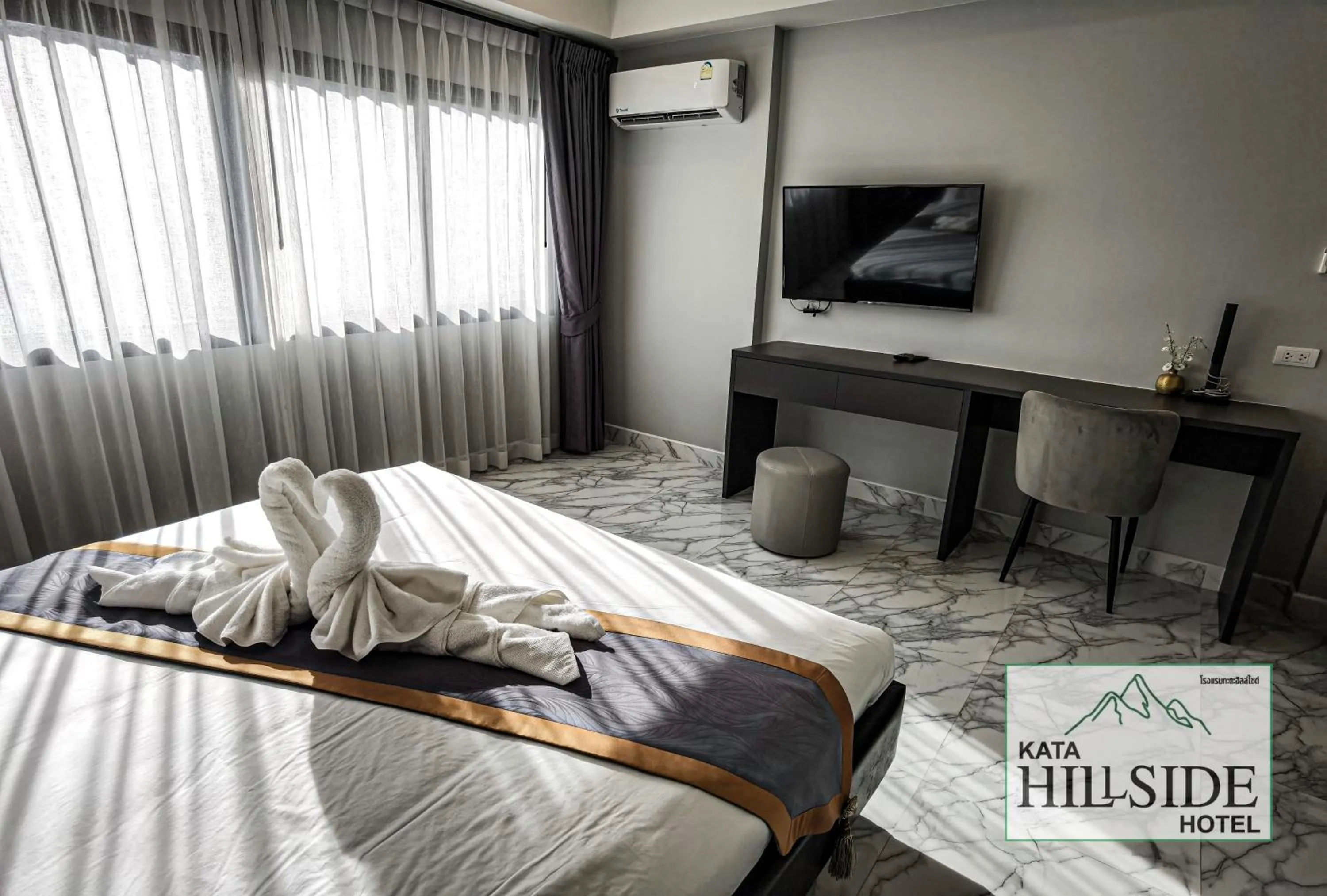 Bed in Kata Hillside Hotel