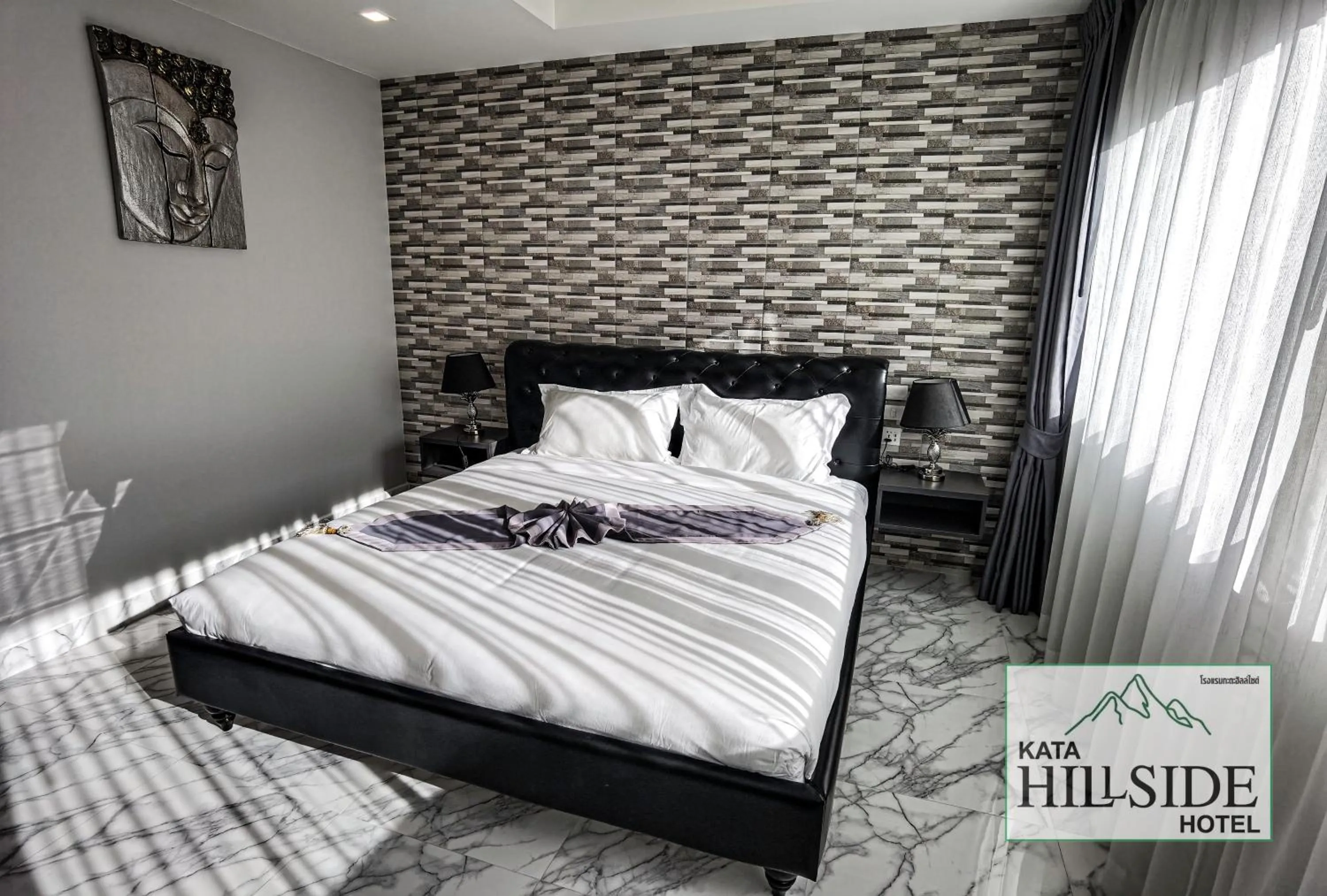 Bed in Kata Hillside Hotel