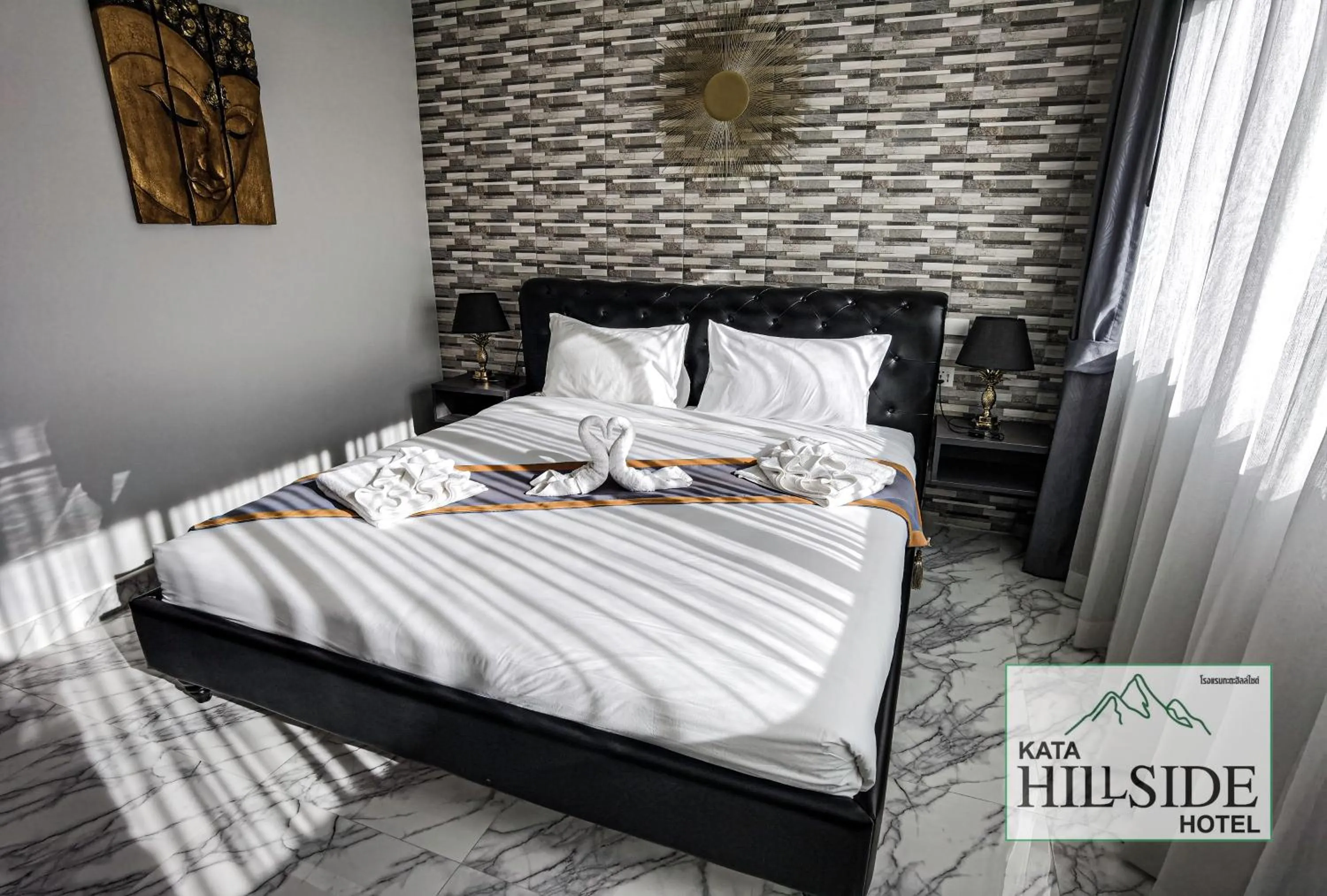 Bed in Kata Hillside Hotel