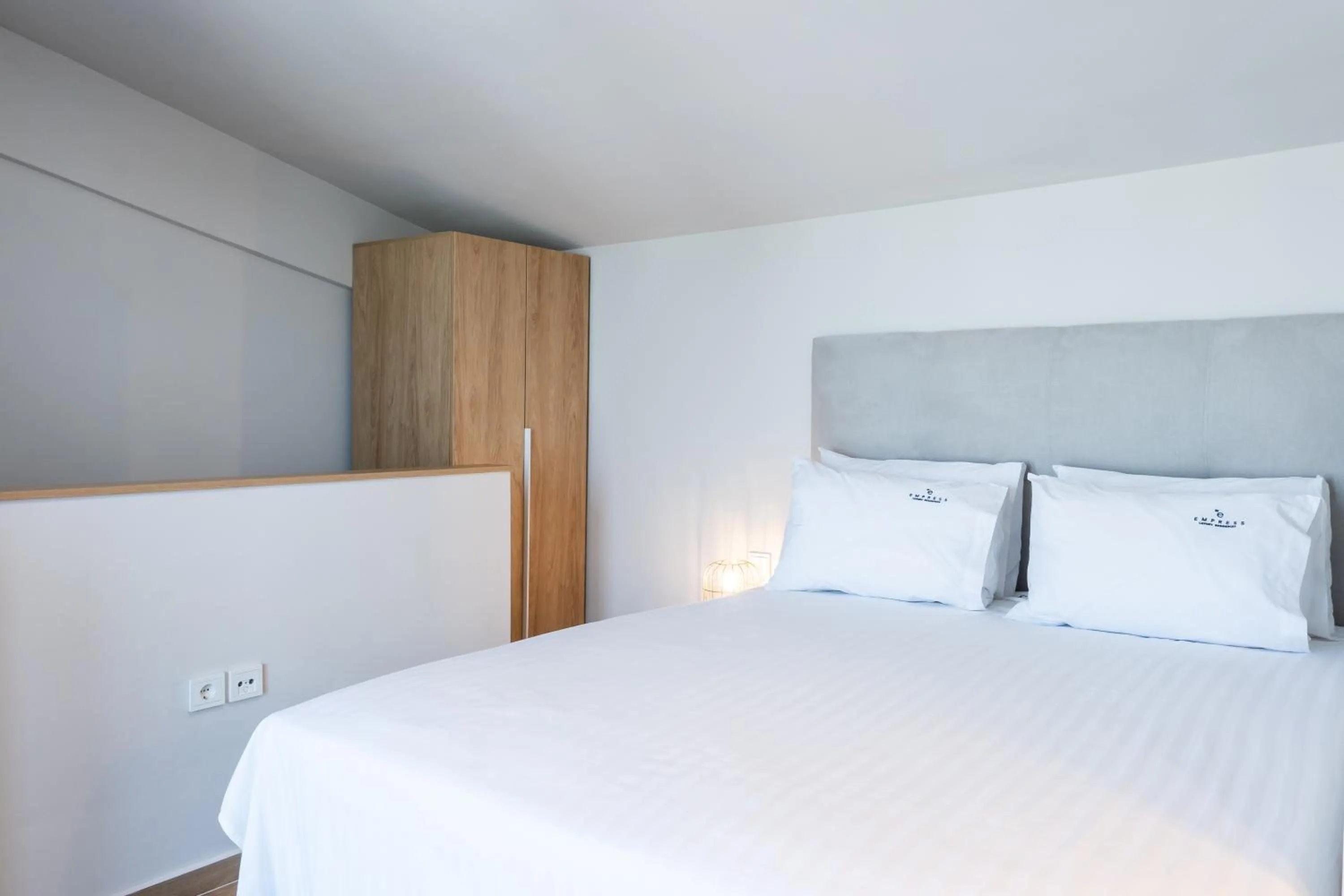 Bed in Empress Luxury Residences