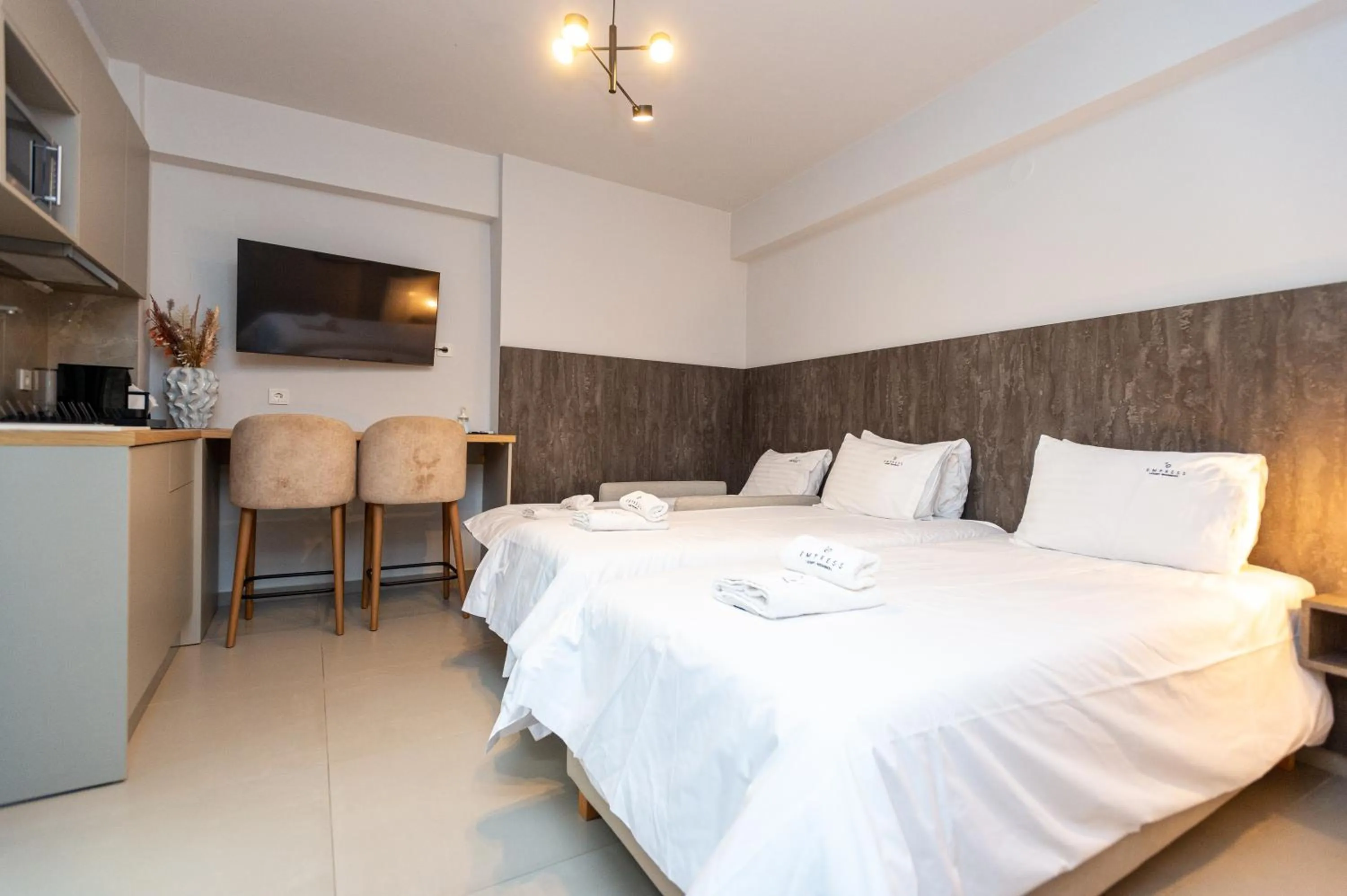 Bed in Empress Luxury Residences