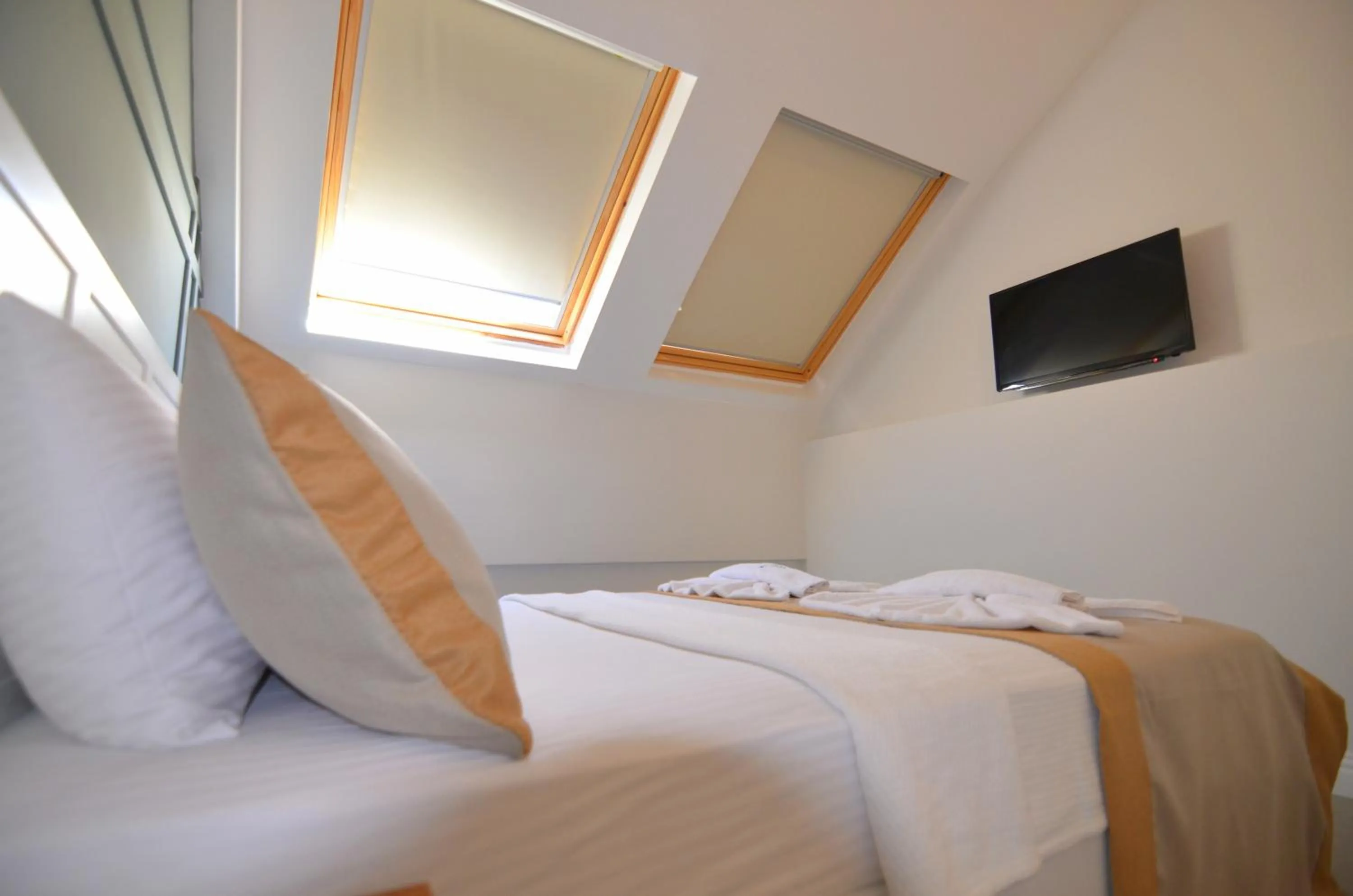 Bed in Juglans Suites