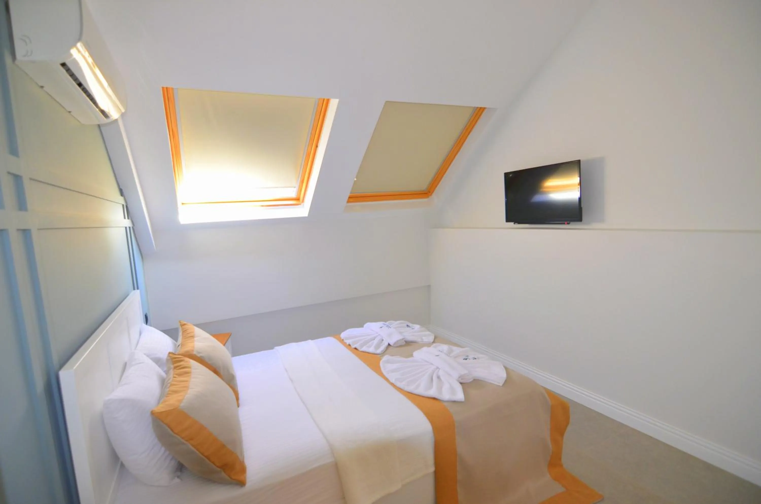 Bed in Juglans Suites