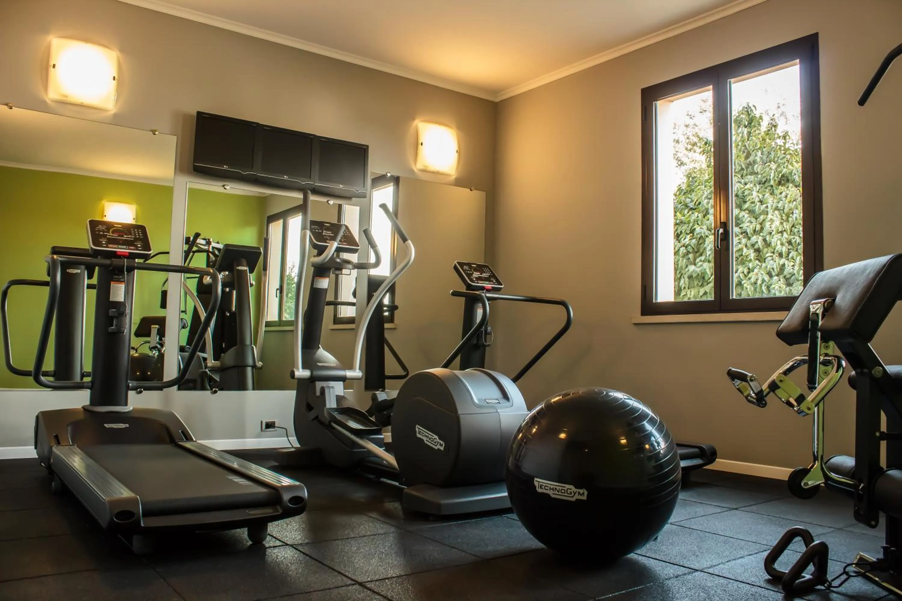 Fitness centre/facilities in UNA HOTELS Occhiobello