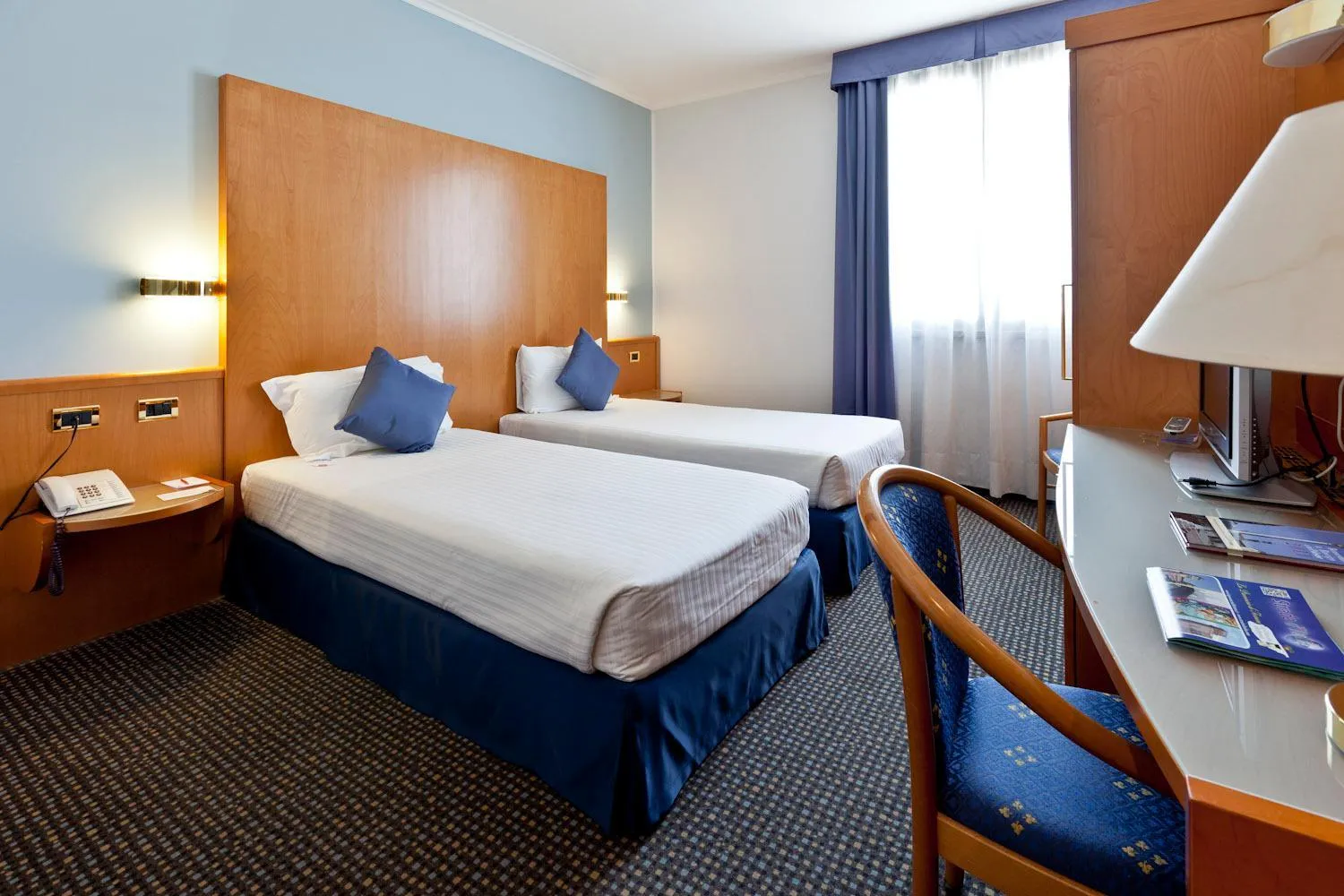 Bed in UNA HOTELS Occhiobello