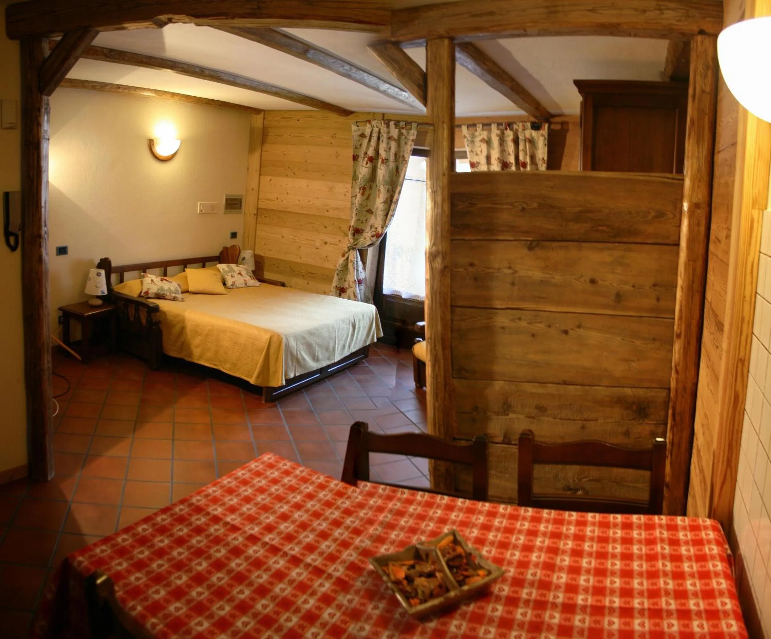 Living room, Bed in Residence Ruetoreif