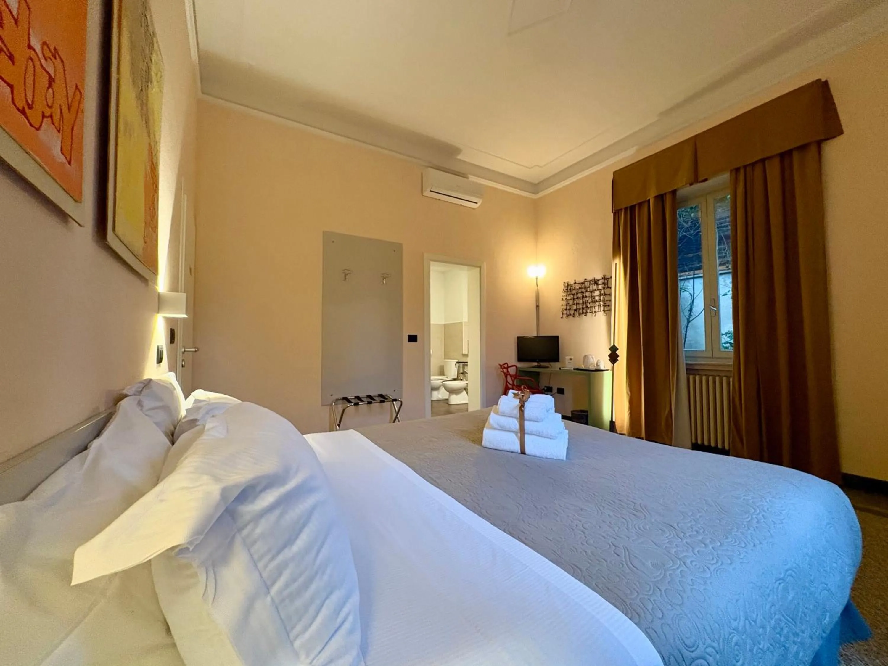 Bed in Lucca In Villa Elisa & Gentucca