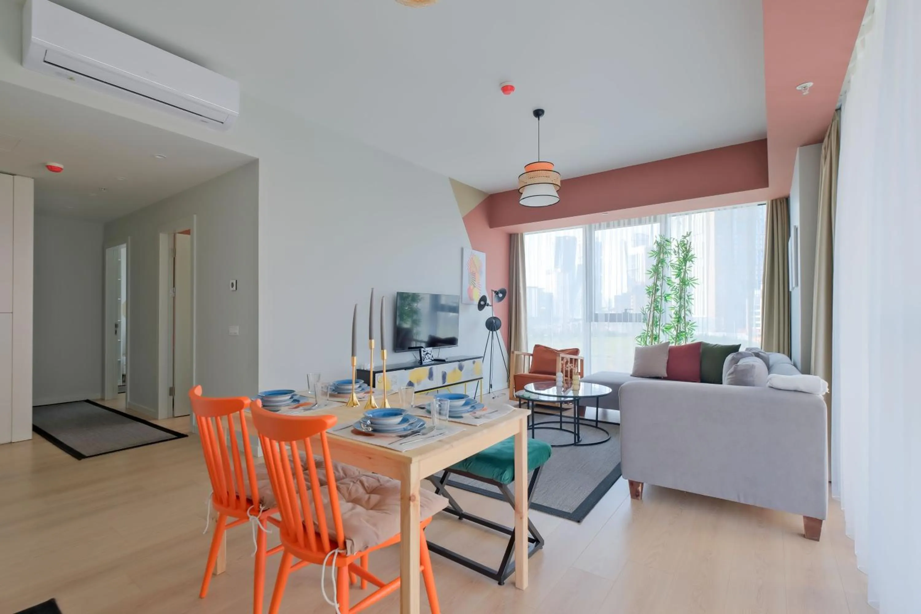 Living room in Roya Nova Residence by NewInn