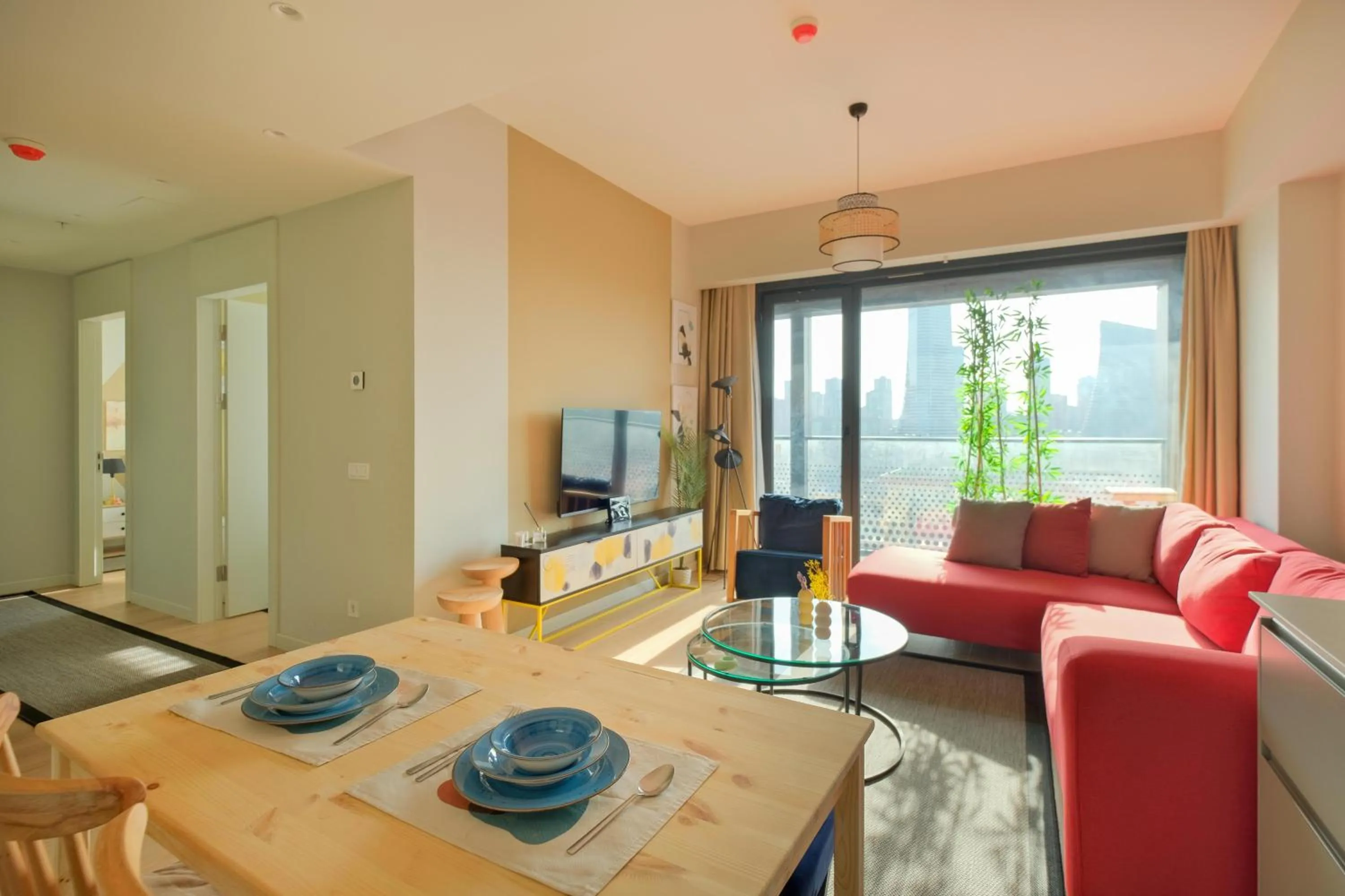 Living room in Roya Nova Residence by NewInn