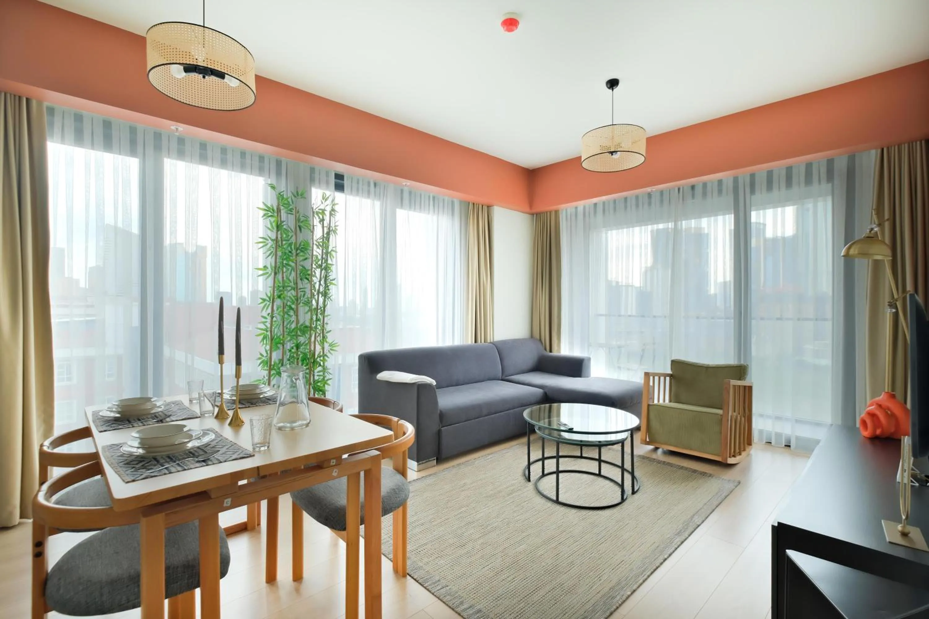 Seating area in Roya Nova Residence by NewInn