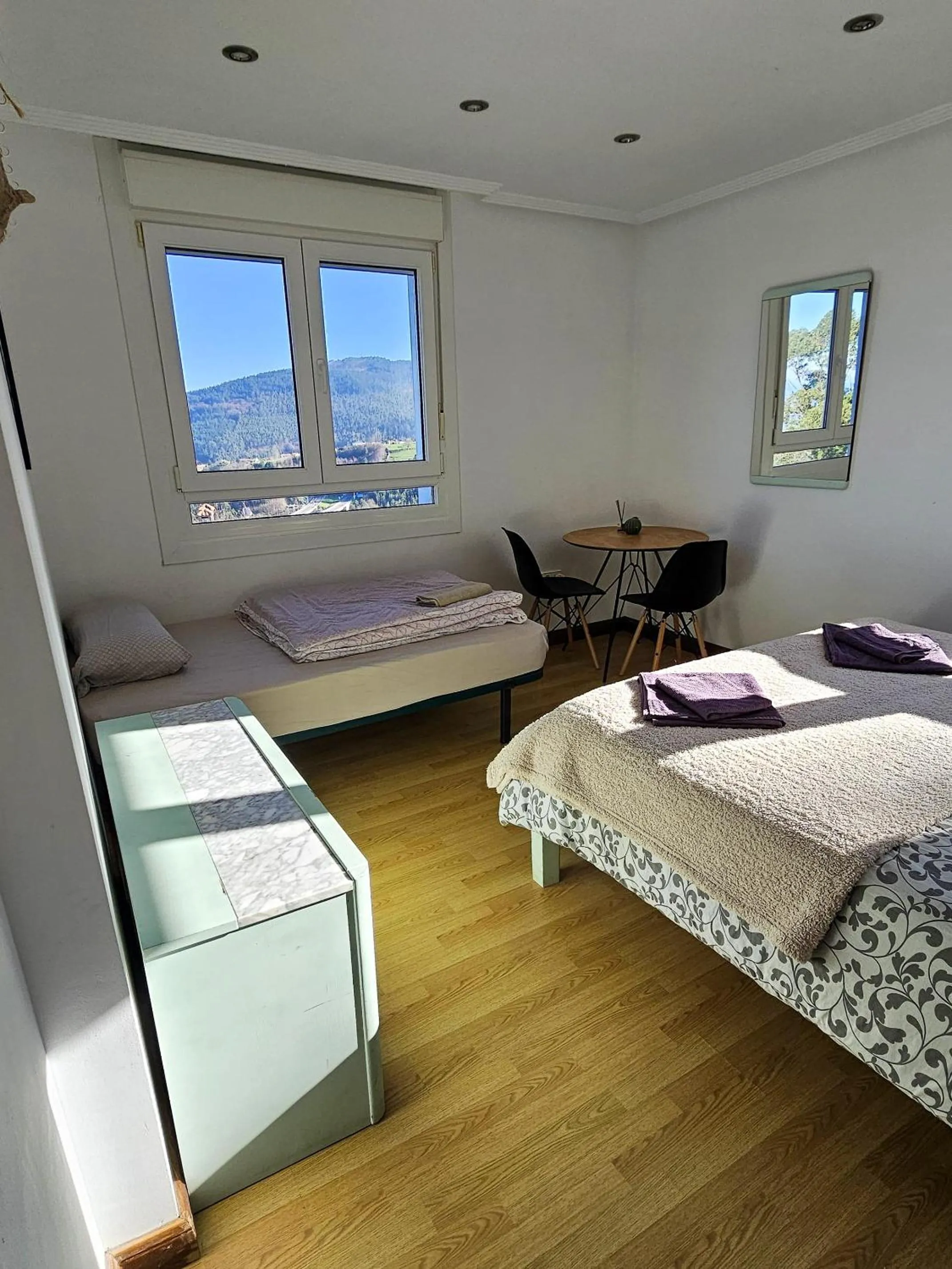 Bed in El Gato Gordo - bike & surf house