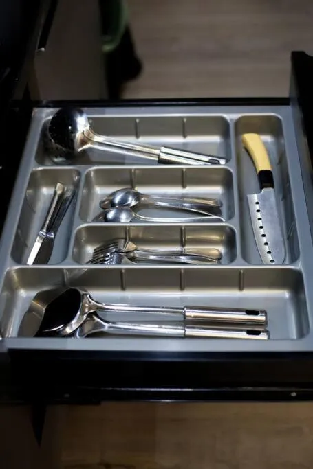 Kitchen or kitchenette in Amandalu at Orchard apartemen