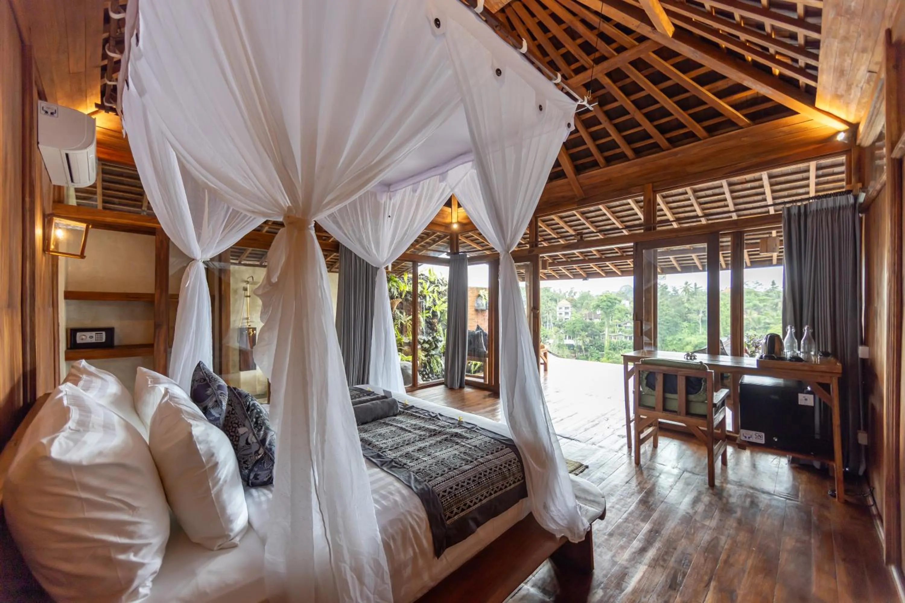 Bed in Joglo Organik Guesthouse