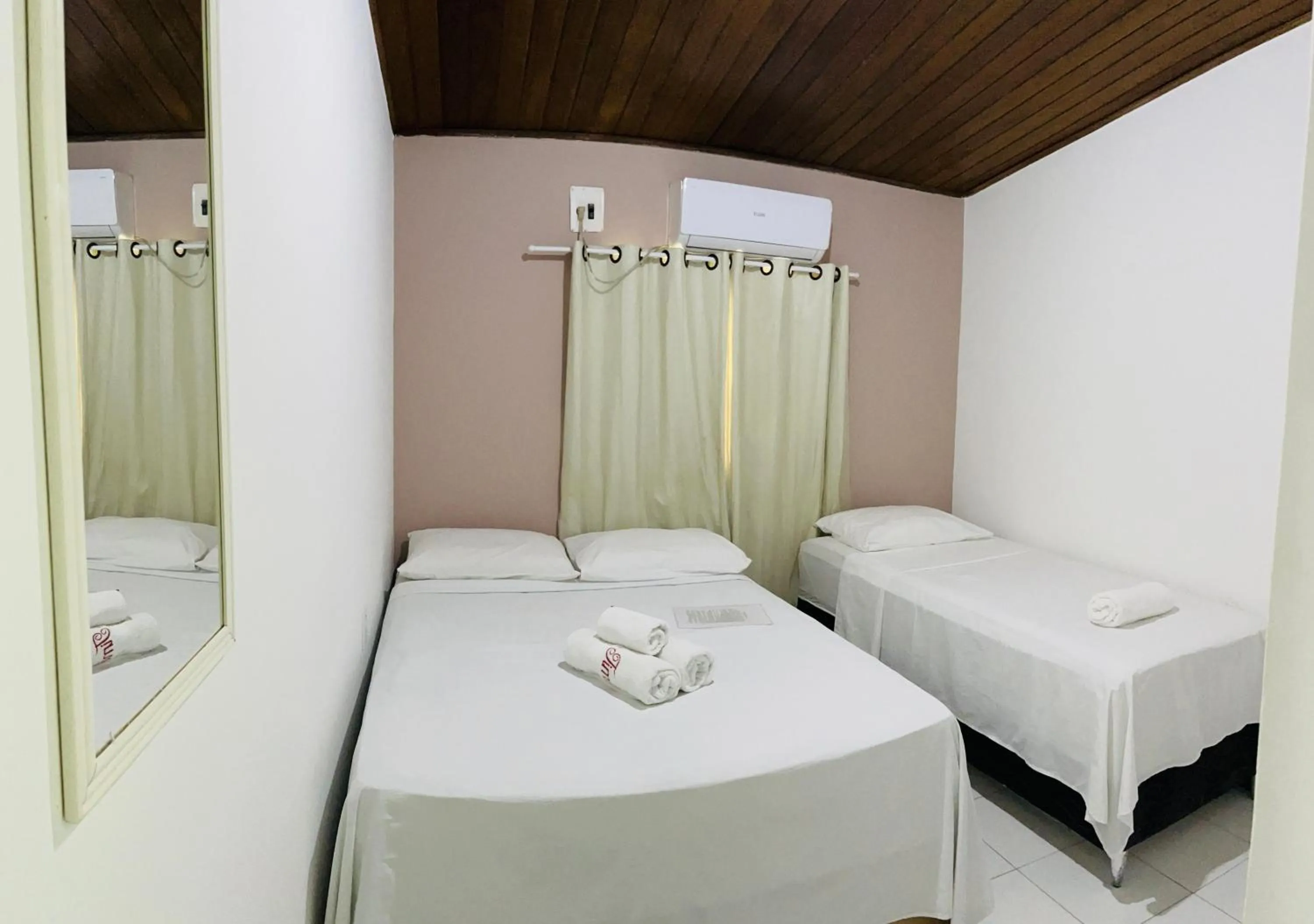 Photo of the whole room, Bed in Pousada Timbalada