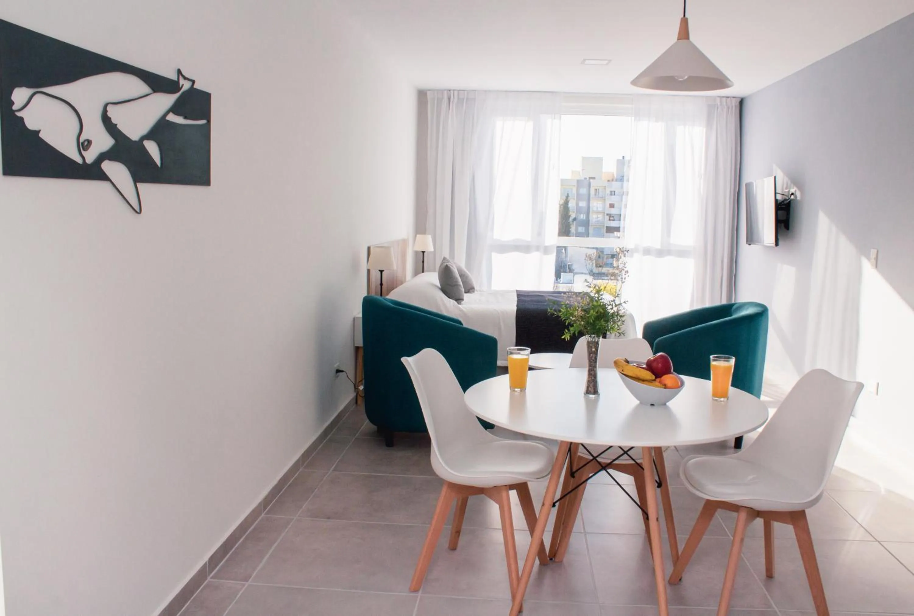 Seating area in Ramada Residences by Wyndham Puerto Madryn CQ Mitre