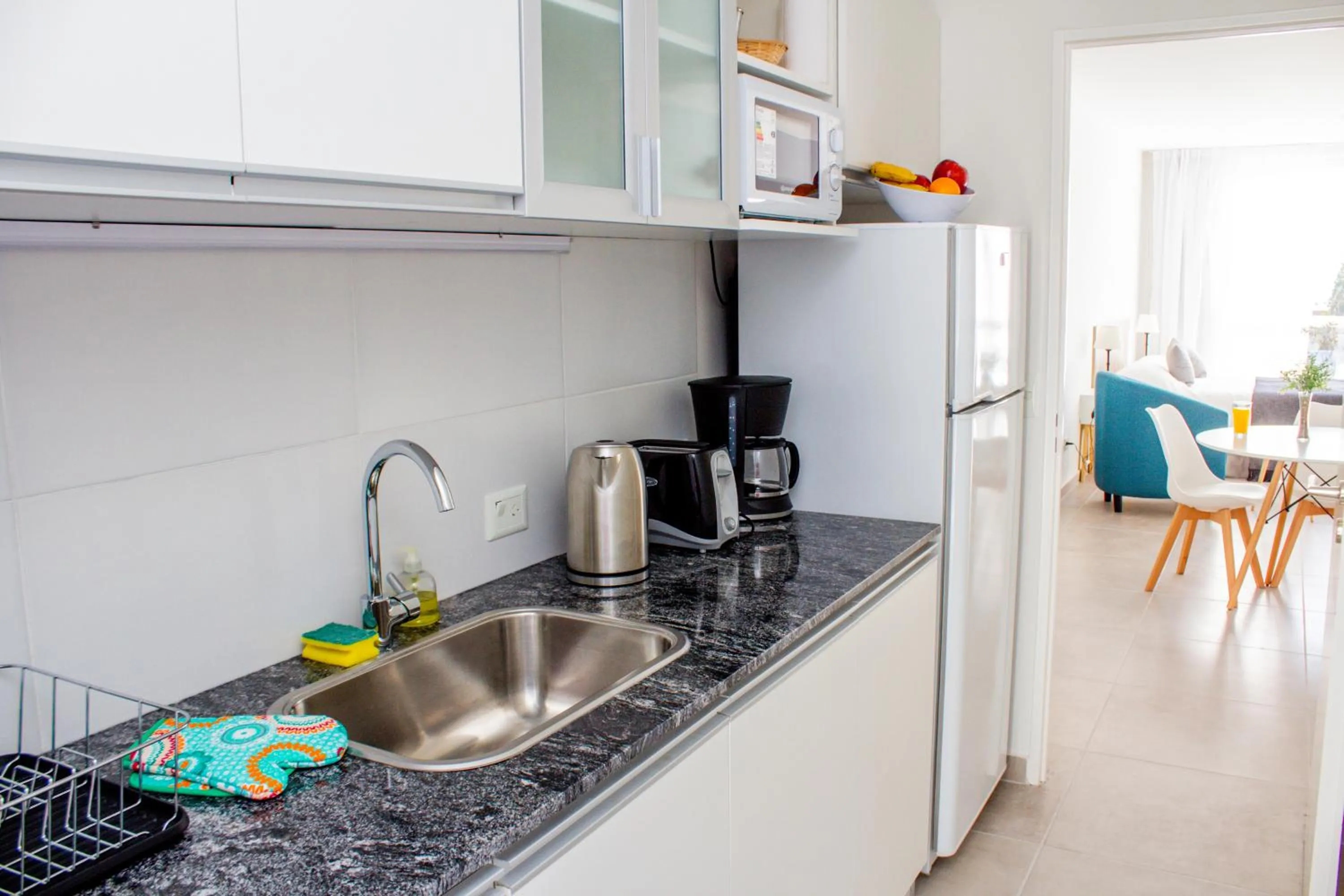 Kitchen or kitchenette in Ramada Residences by Wyndham Puerto Madryn CQ Mitre