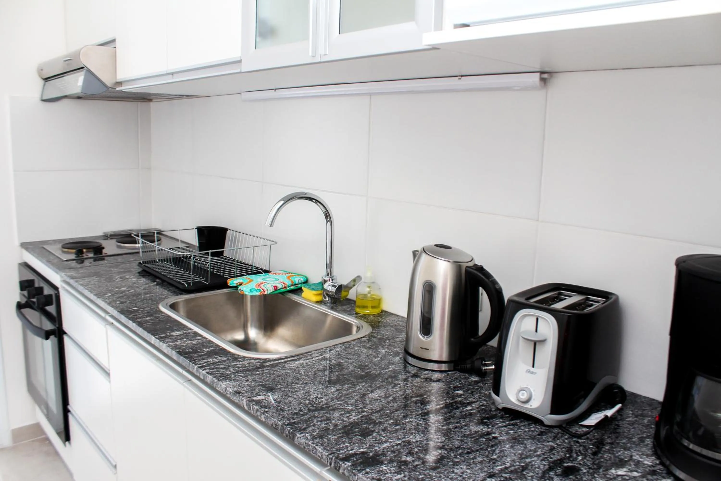 Kitchen or kitchenette in Ramada Residences by Wyndham Puerto Madryn CQ Mitre