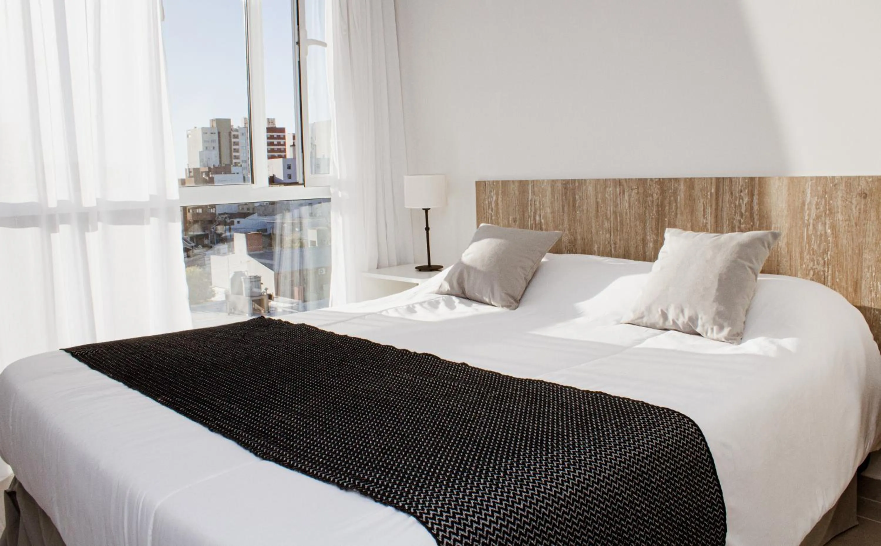 Bed in Ramada Residences by Wyndham Puerto Madryn CQ Mitre