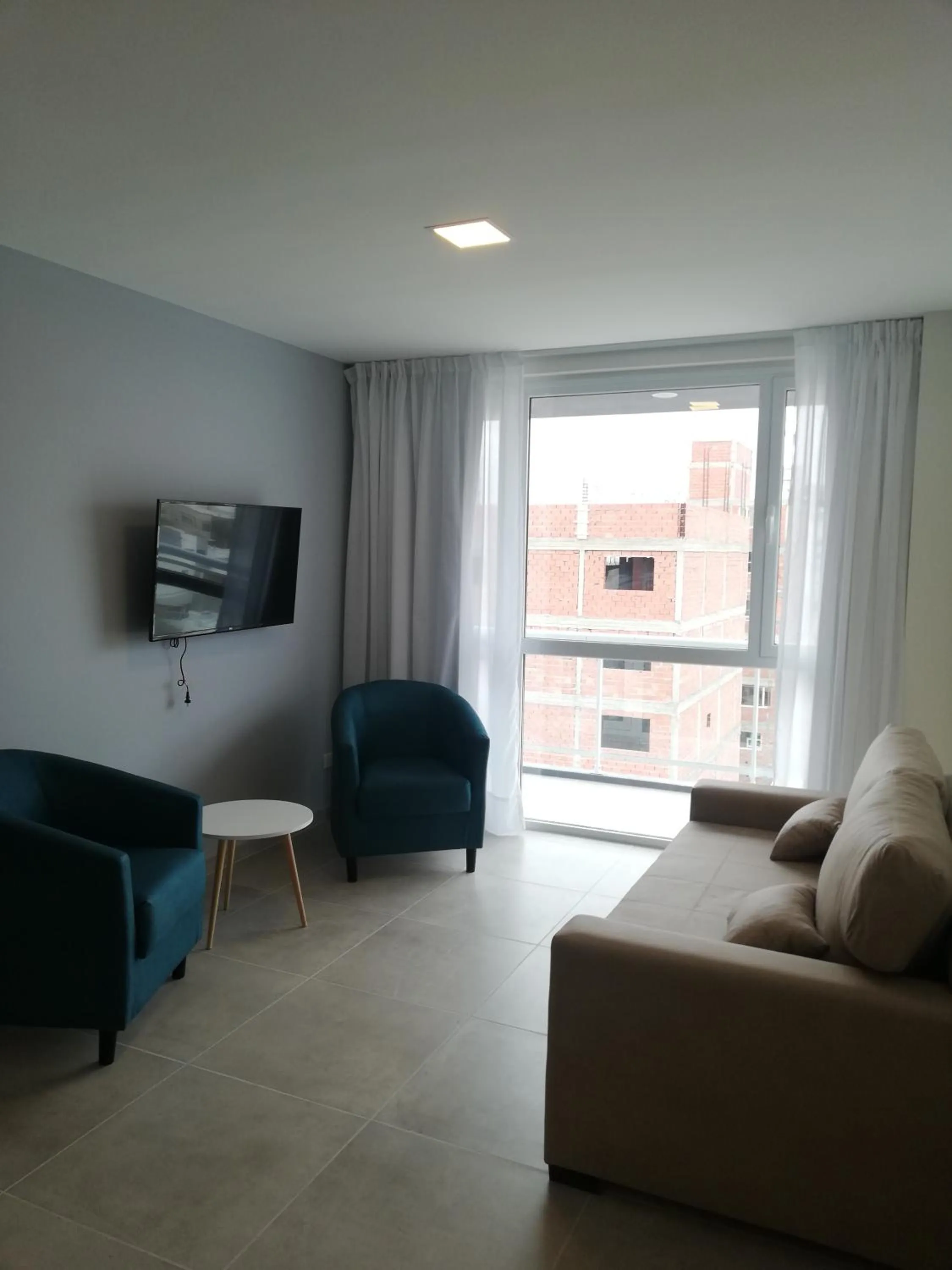 Living room in Ramada Residences by Wyndham Puerto Madryn CQ Mitre